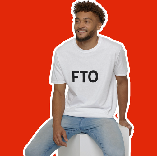 Person wearing a white T-shirt with "FTO" printed in bold black letters, seated and smiling against a bold red background.