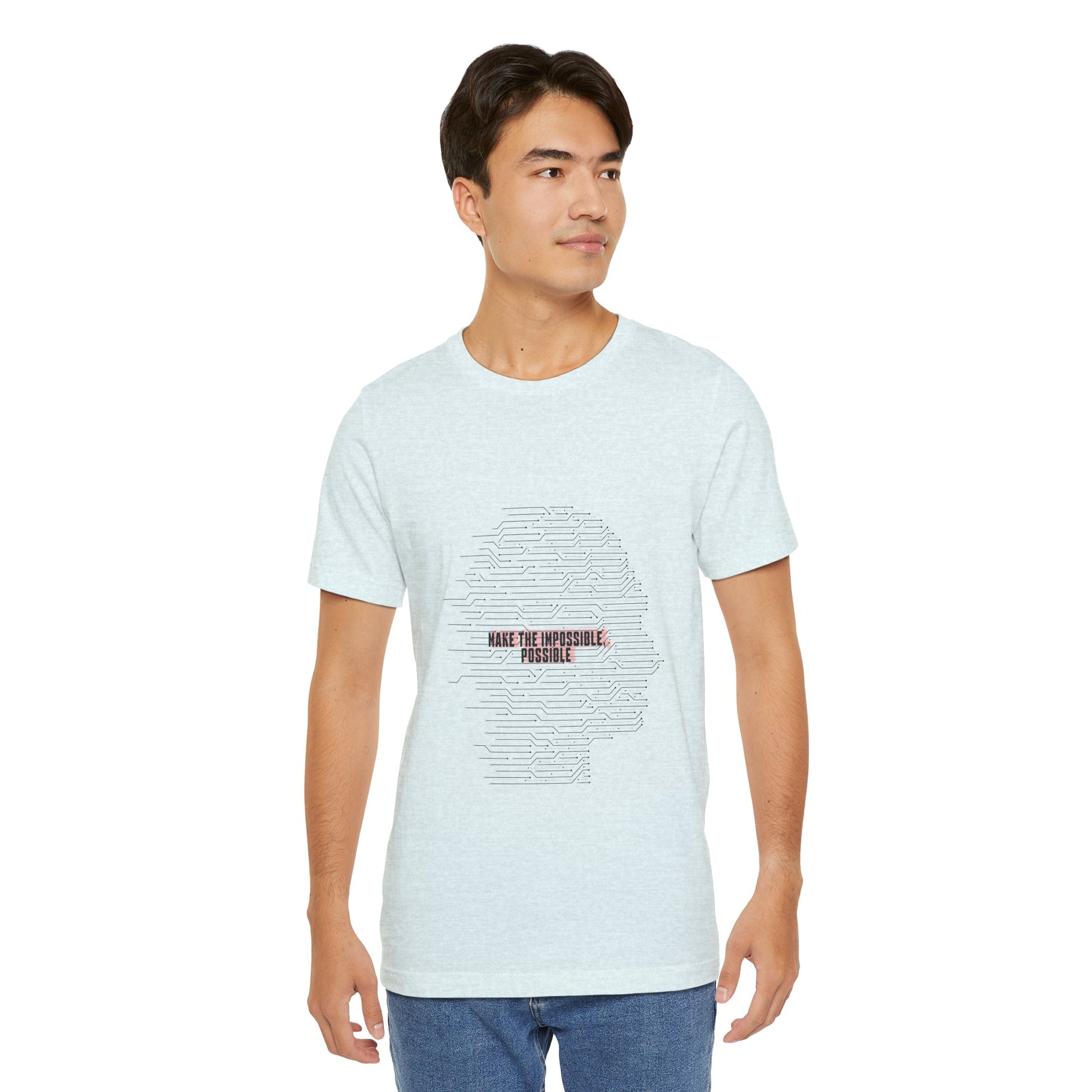 Man wearing light blue Make It Possible T-Shirt styled casually.