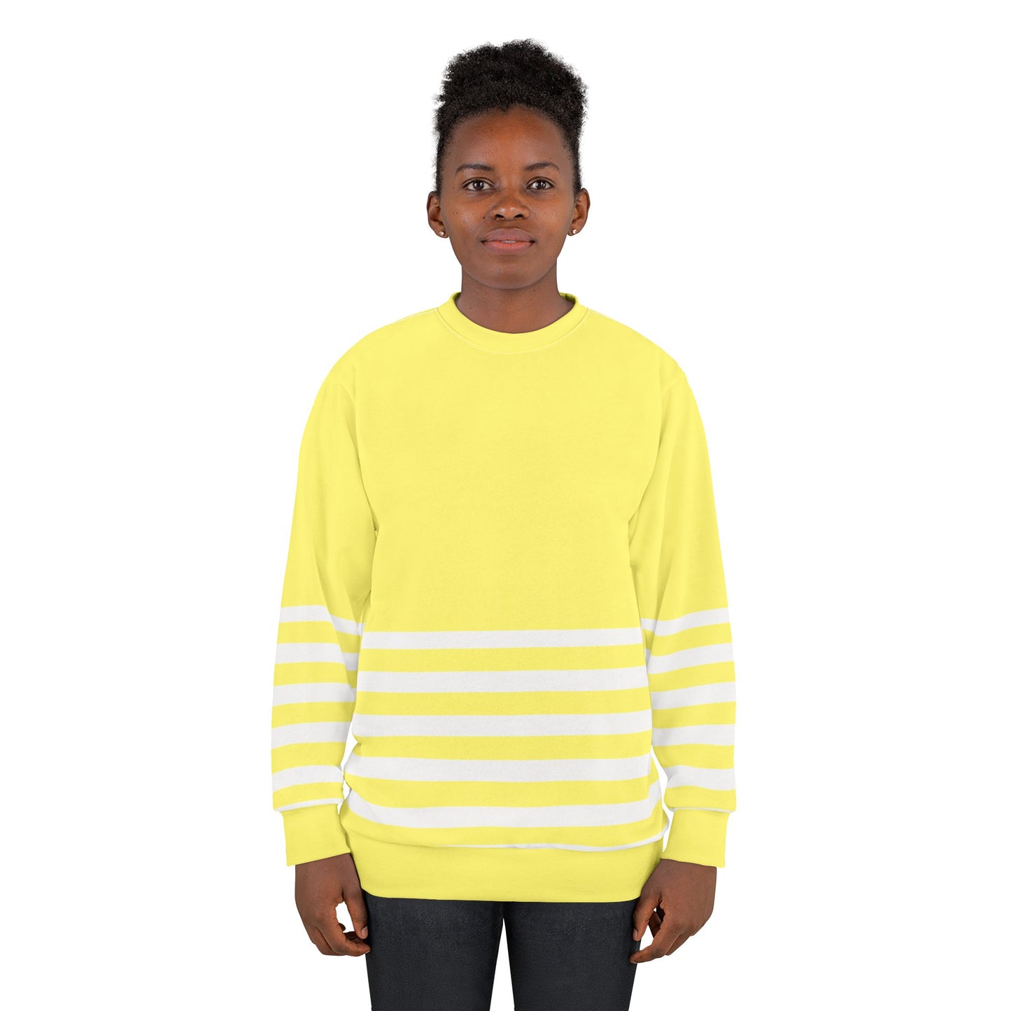 Front view of yellow striped sweatshirt on model with crew neck design
