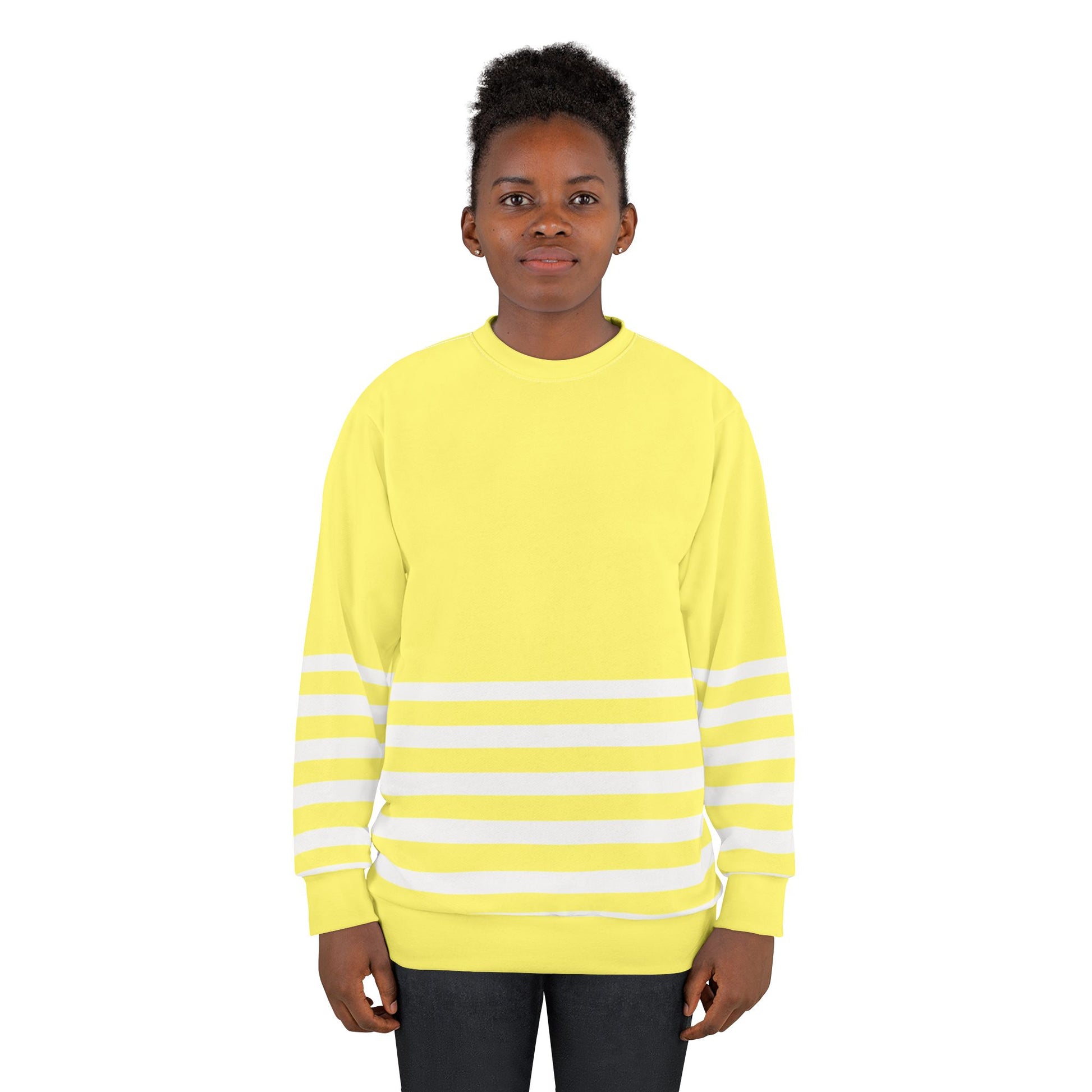 Front view of yellow striped sweatshirt on model with crew neck design