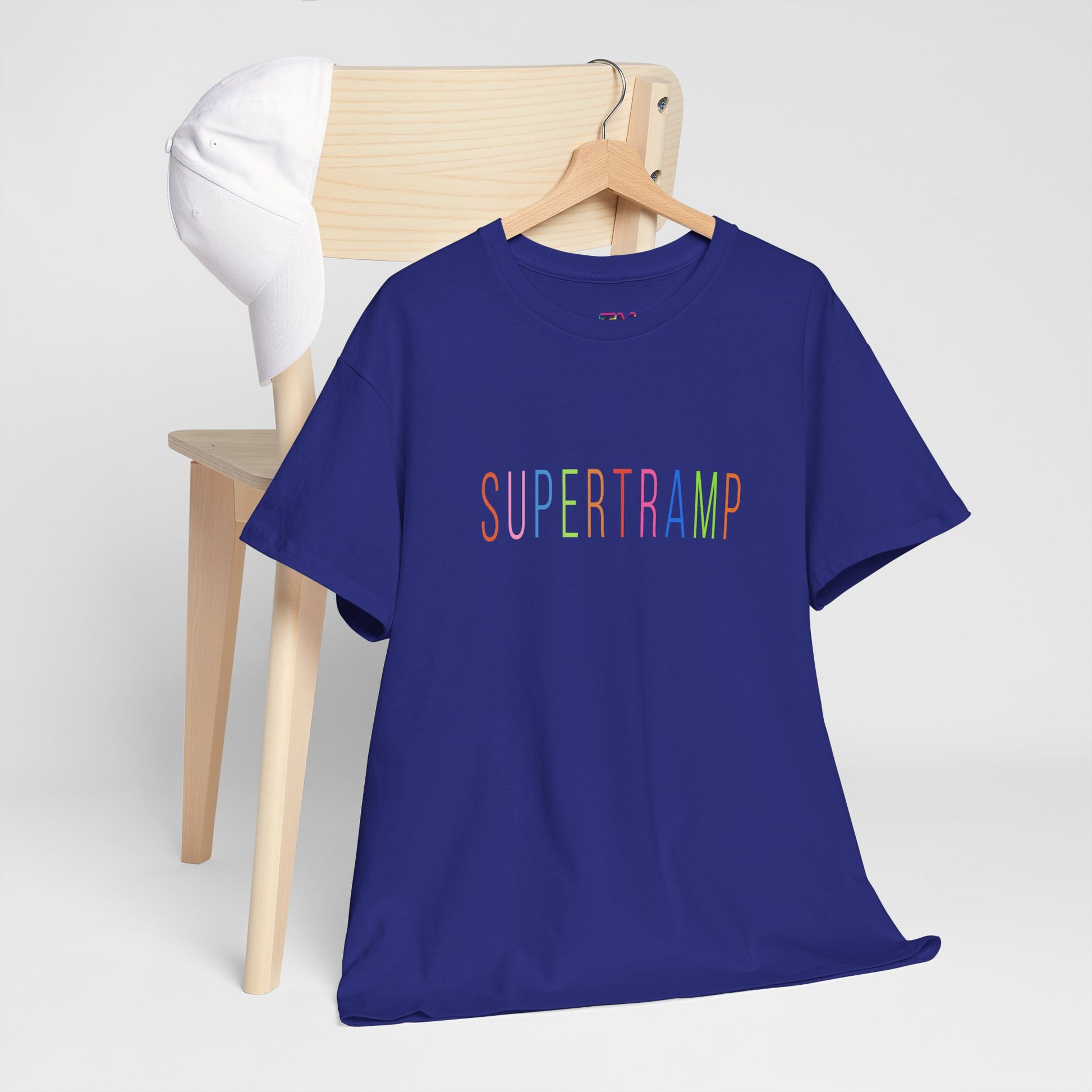 Duplicate of royal blue Supertramp t-shirt on hanger and chair.