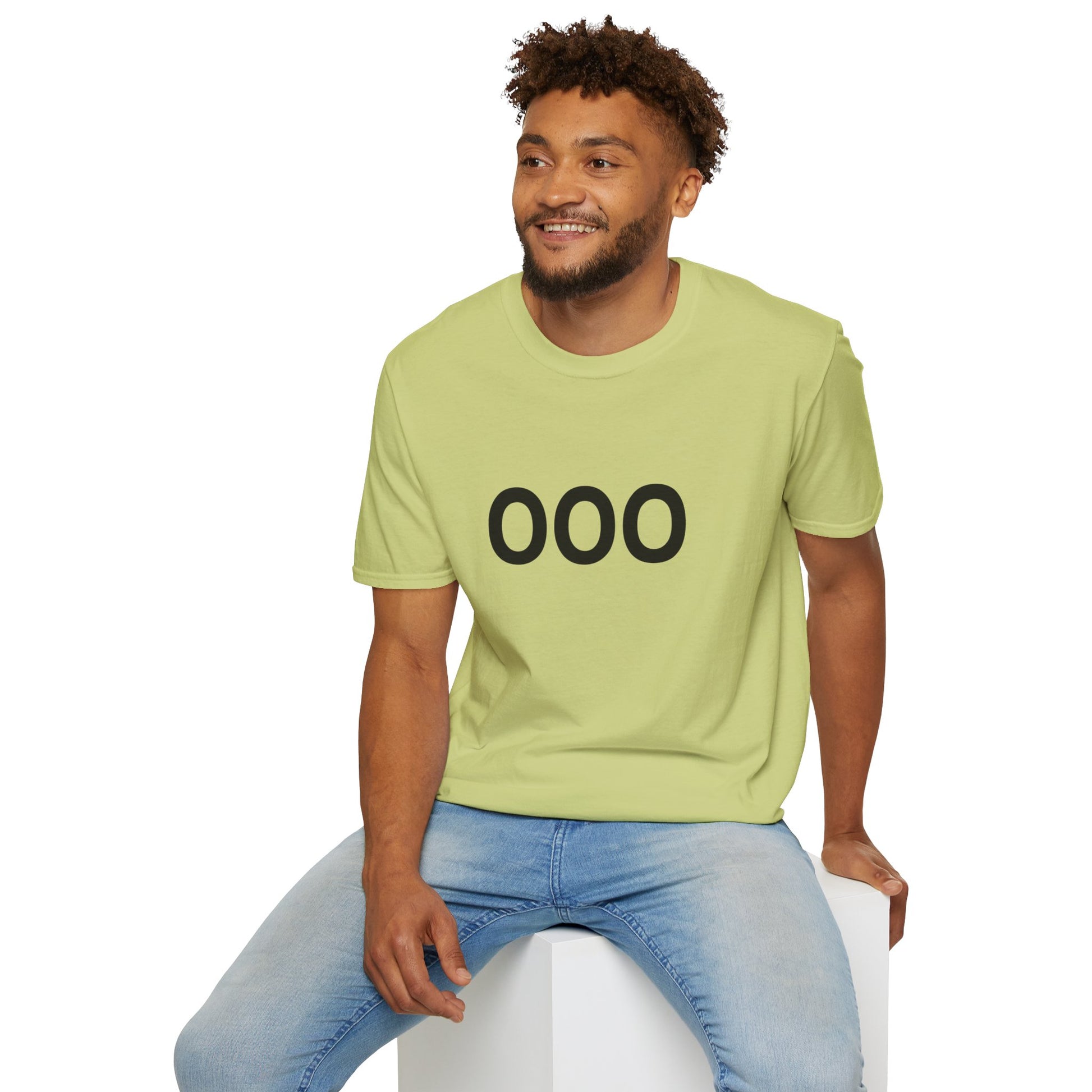 Person sitting wearing olive green OOO T-shirt paired with jeans