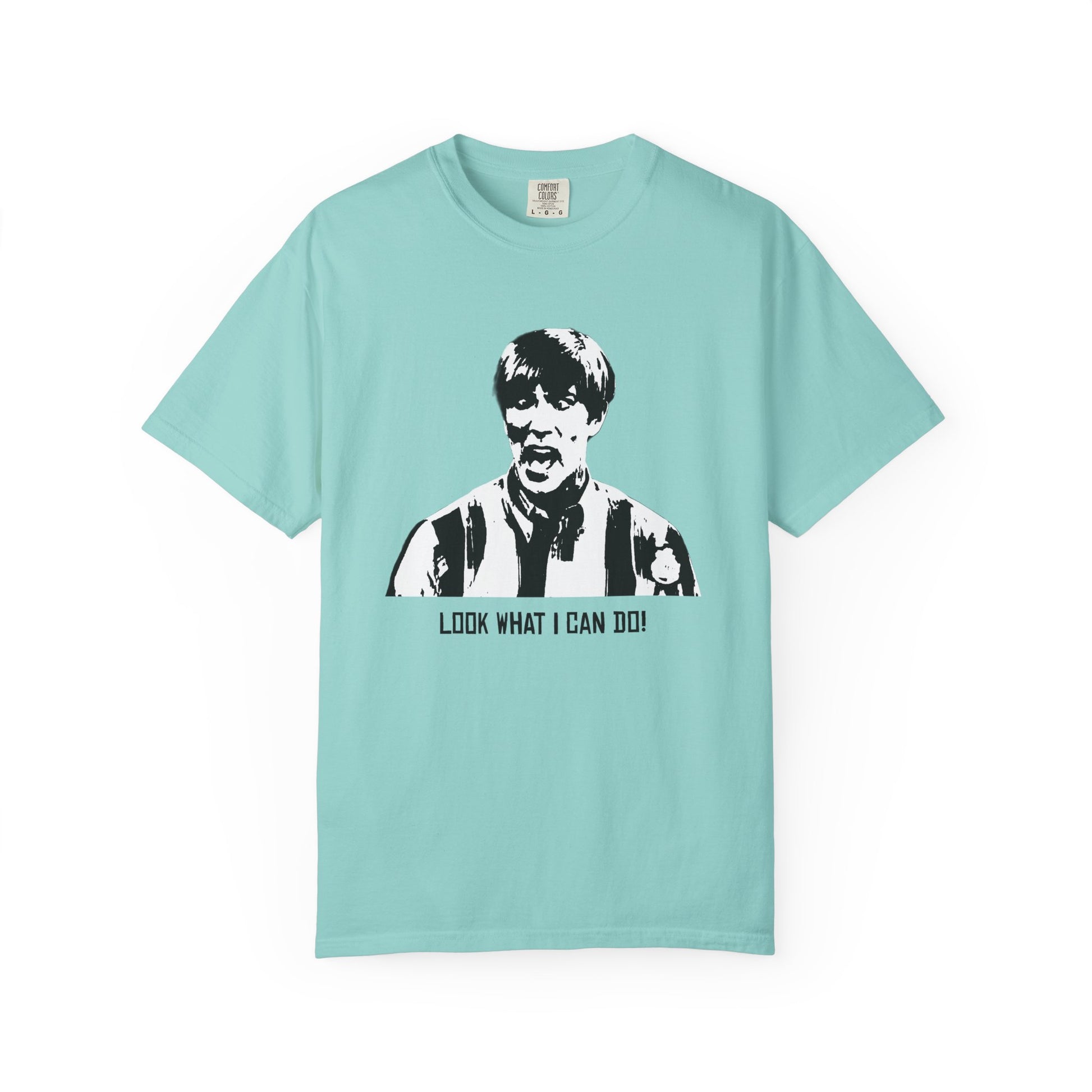 Mint green Stuart T-shirt with graphic of Michael McDonald’s character, laid flat.