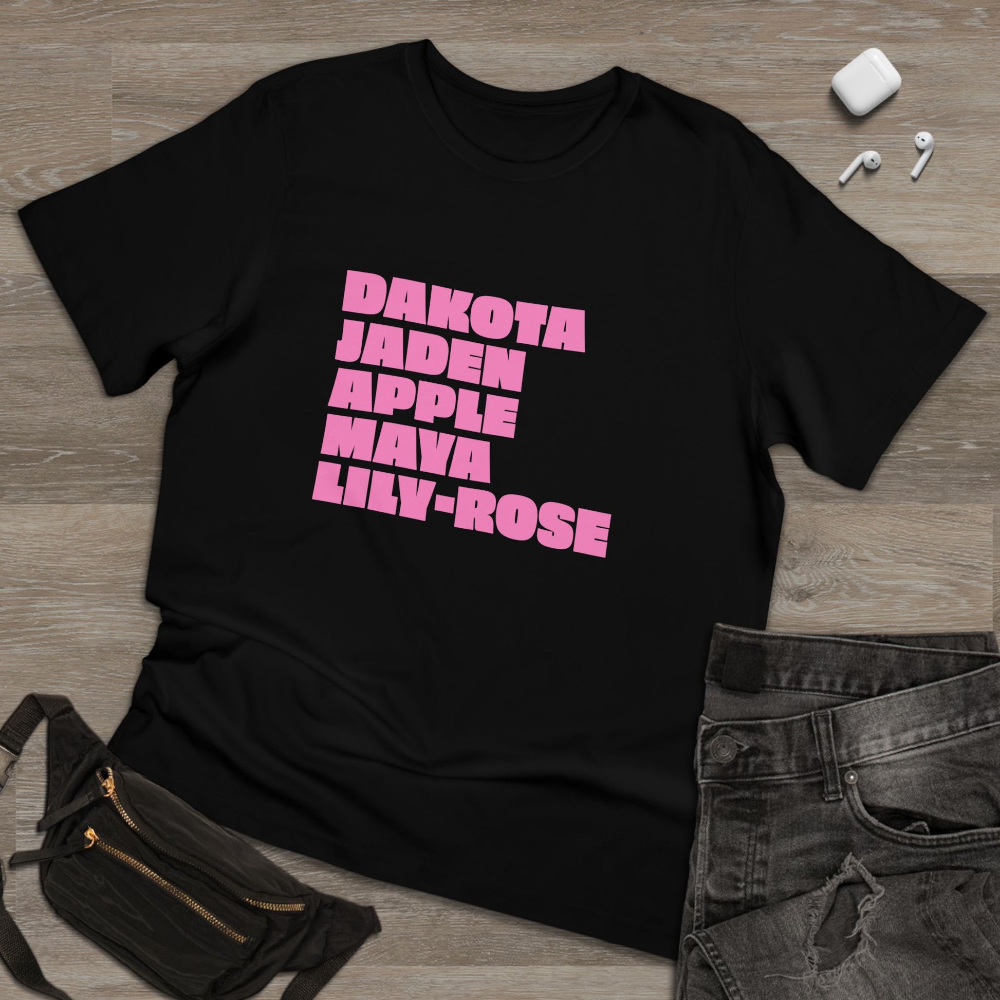 Black Nepo Babies List T-Shirt with pink lettering flat lay