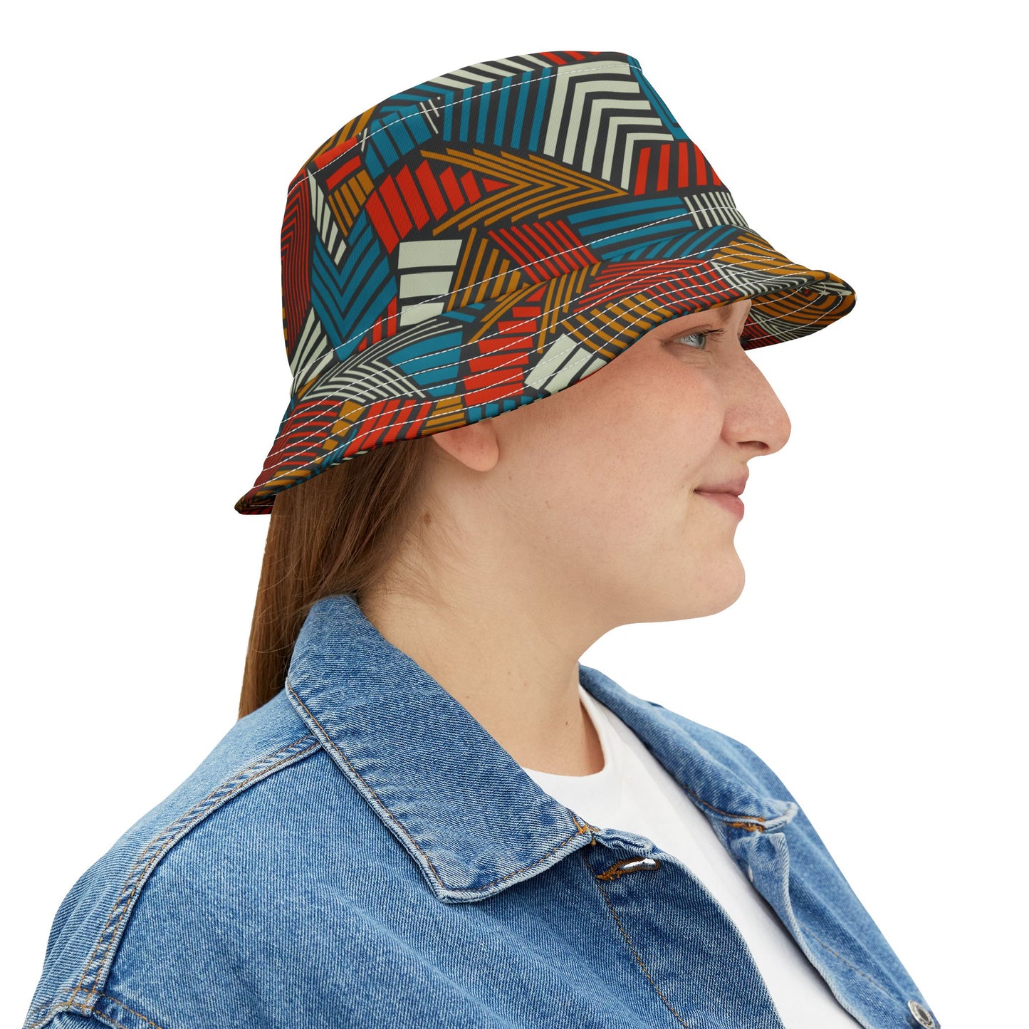 Side view of Urban Safari Bucket Hat worn by woman in denim jacket.