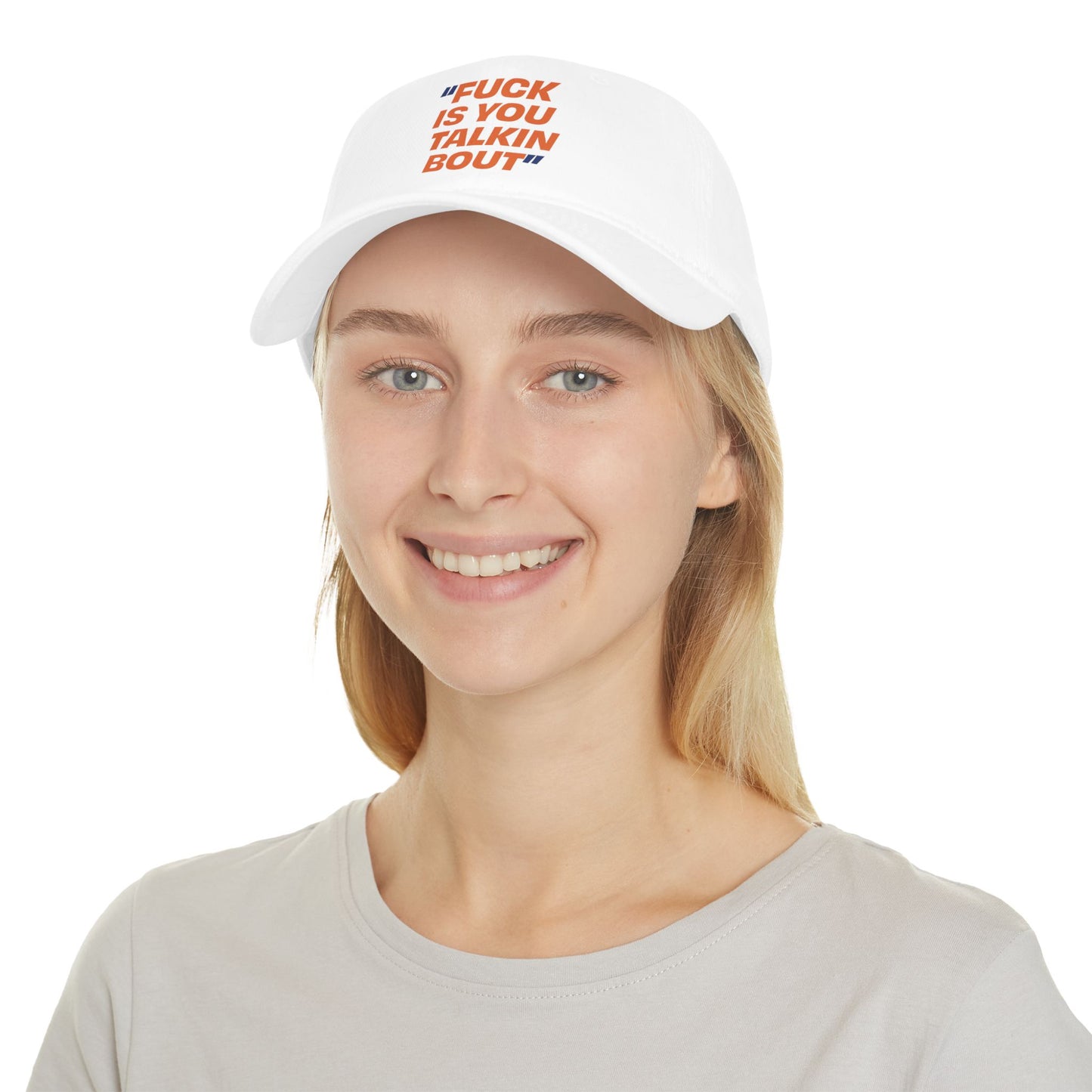 Female model wearing the Fuckisyoutalkinbout cotton baseball cap featuring New Yorker slang embroidery.