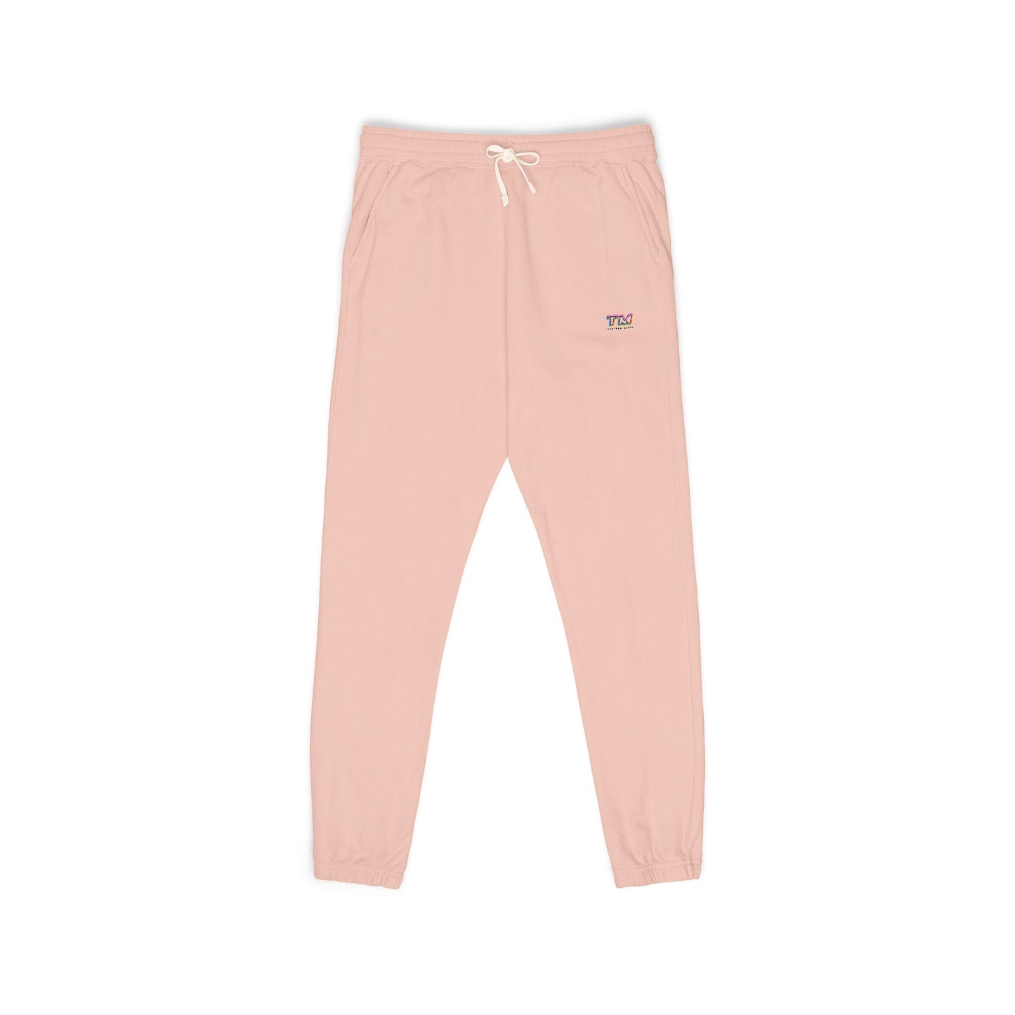 Peach sweatpants with a small Tantrum Media logo on a white background
