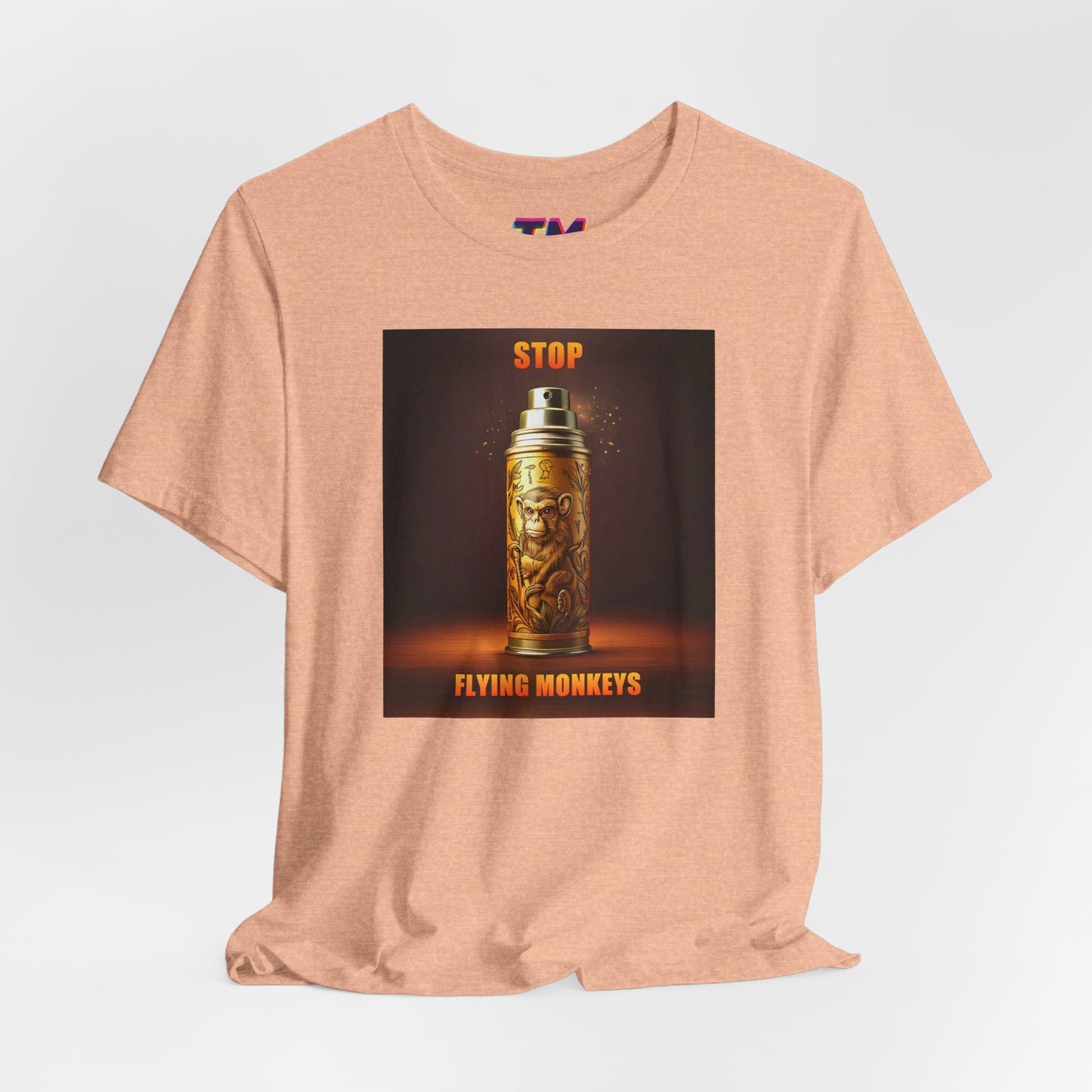 Peach Stop Flying Monkeys T-Shirt folded with design front and center