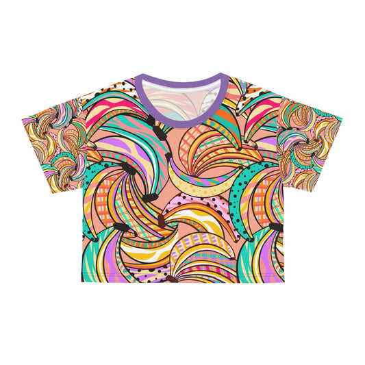 Crazy Bananas Crop Tee featuring a vibrant and playful banana print, colorful abstract patterns, and a lightweight fabric for trendy summer fashion.