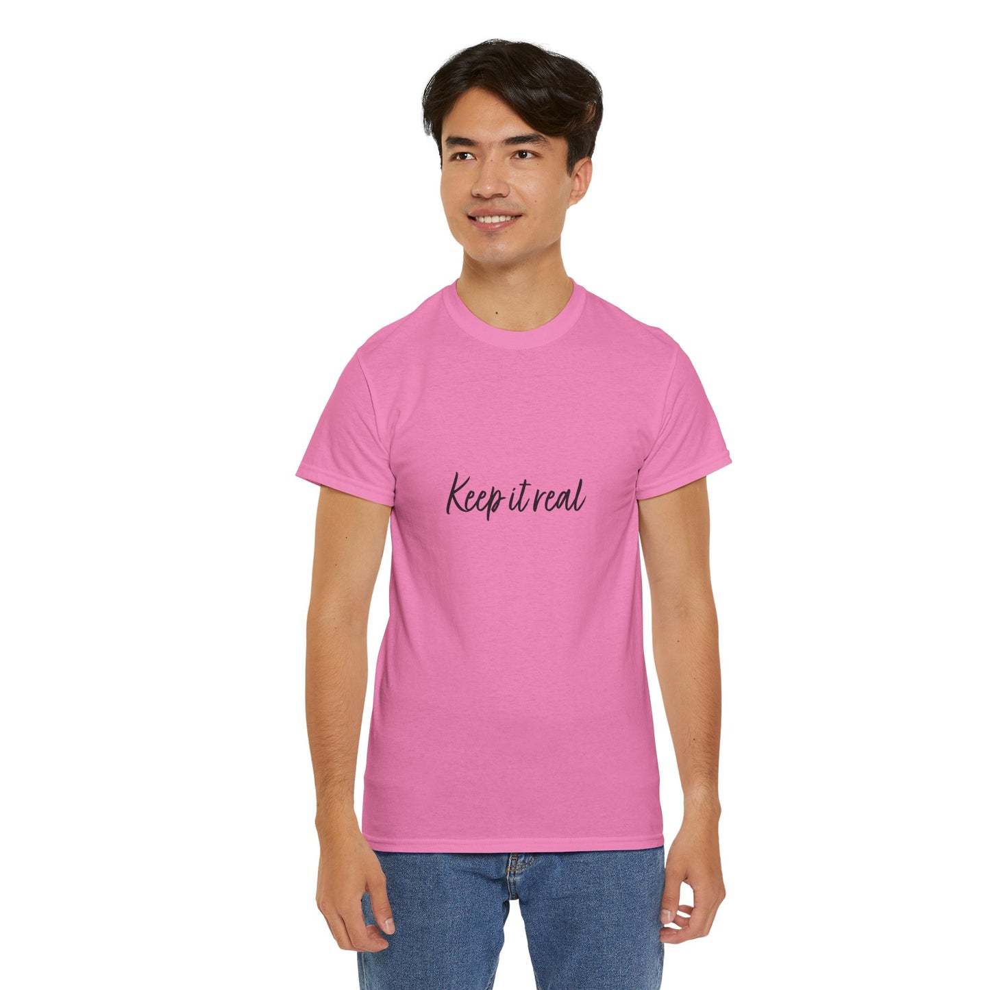Man wearing darker pink Keep it real T-Shirt smiling