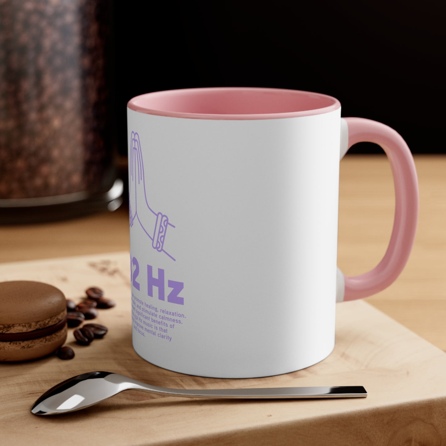 White 432 Hz frequency mug pink interior on table with spoon