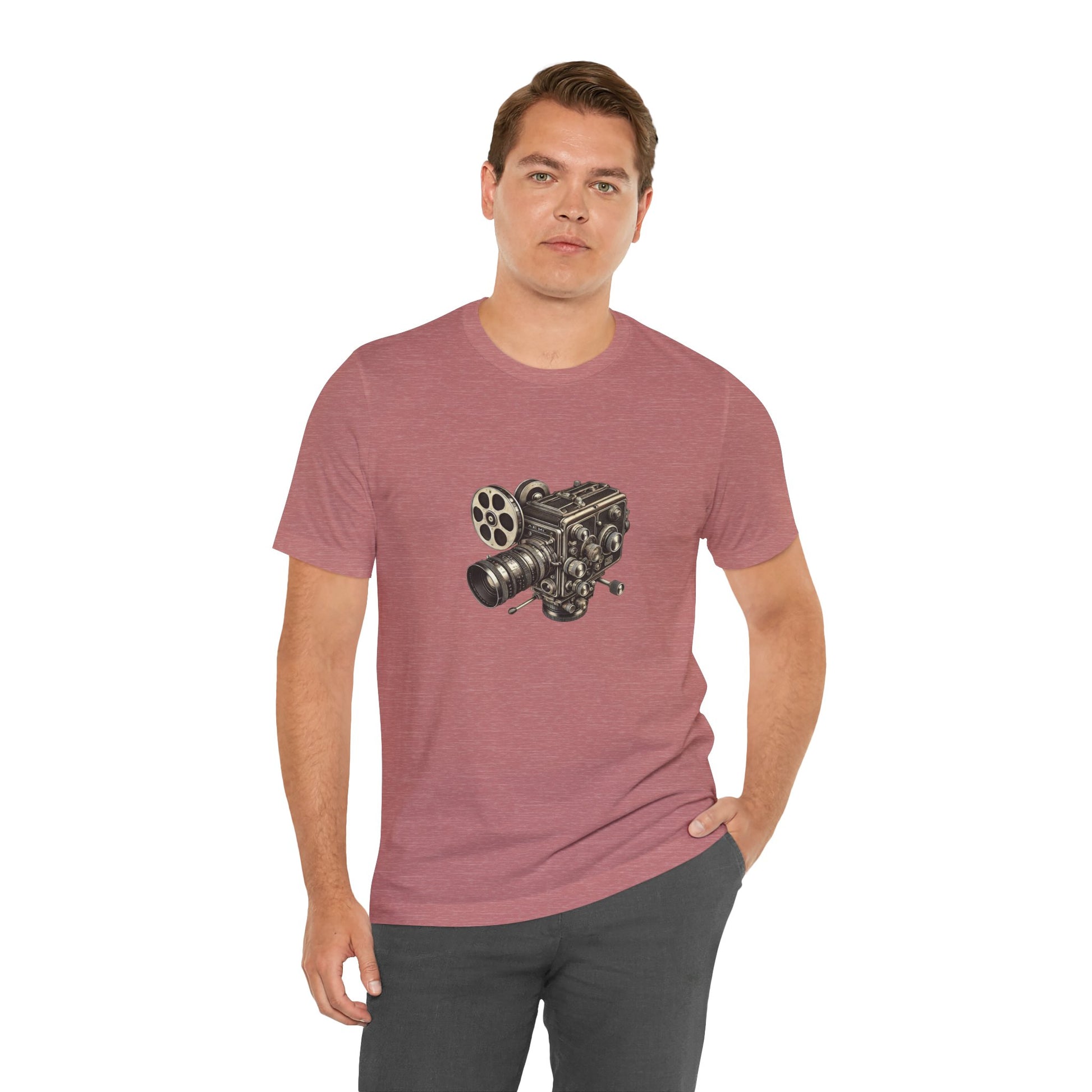 Man wearing rust red t-shirt with vintage 16mm camera design and gray pants