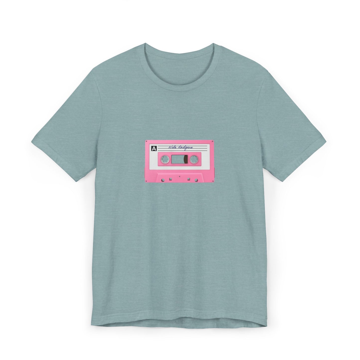 Light green t-shirt featuring pink cassette tape print, laid flat.