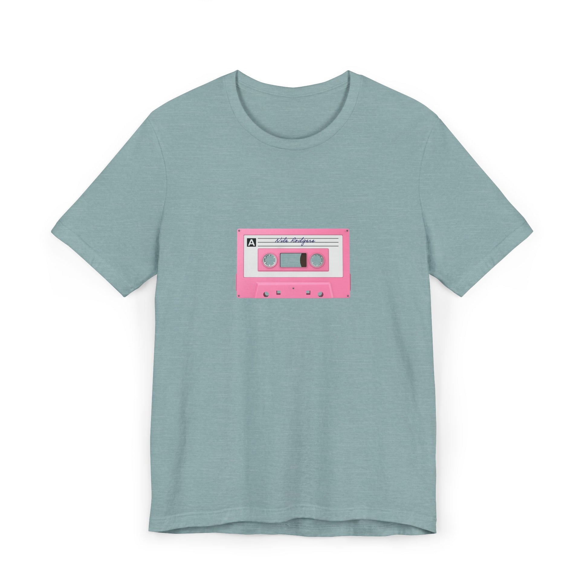 Light green t-shirt featuring pink cassette tape print, laid flat.