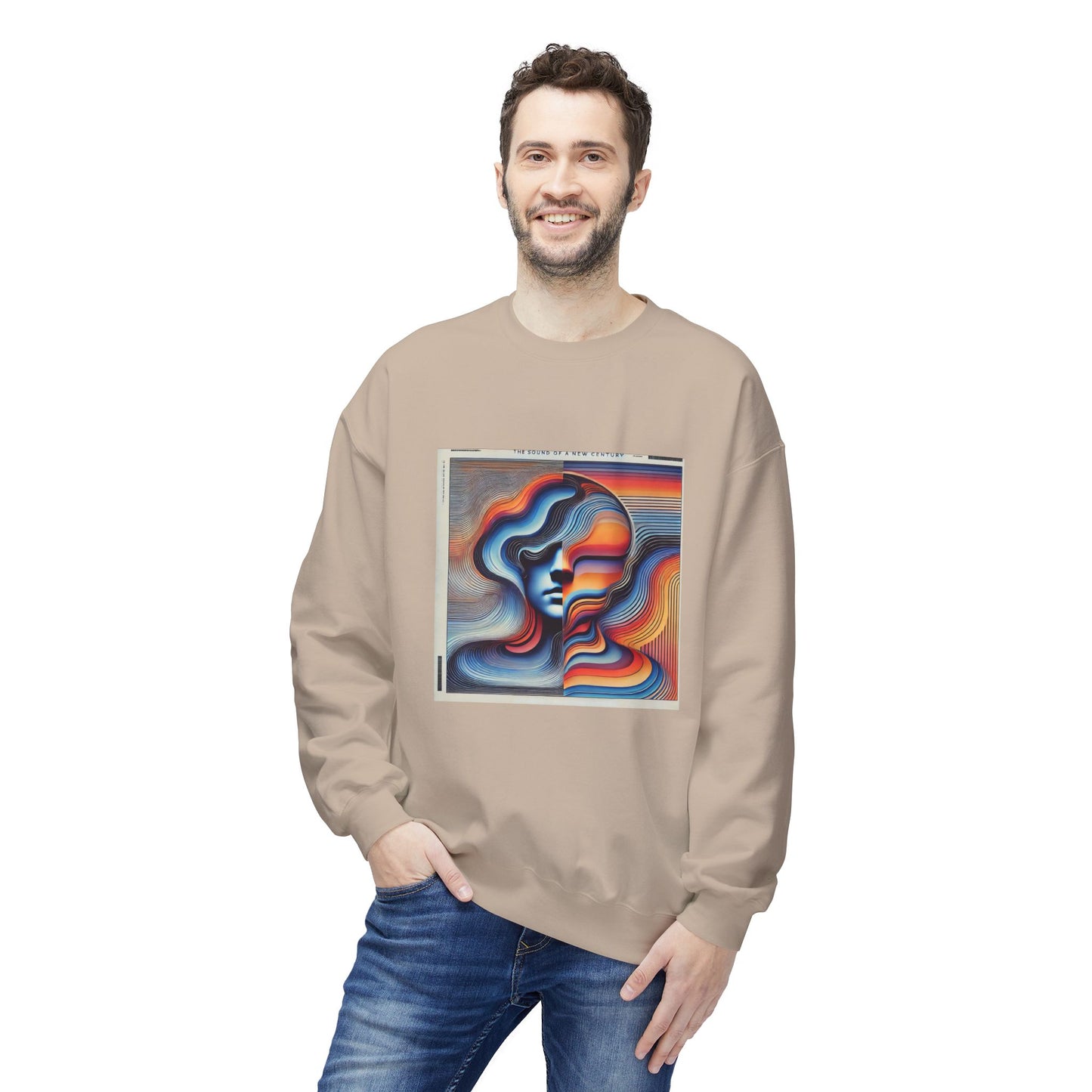 Man wearing a tan sweatshirt with the abstract album cover artwork, standing facing forward.