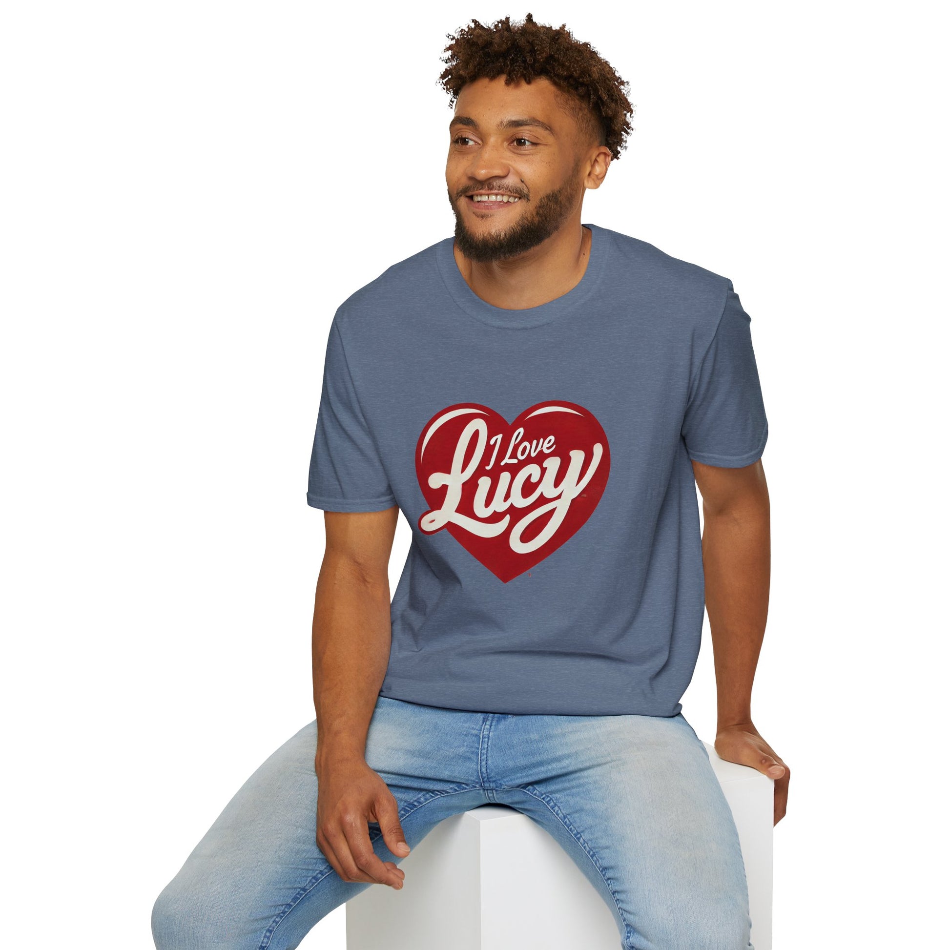 A person wearing a red crew neck t-shirt with a heart logo that has the text 'I Love Lucy' on it.