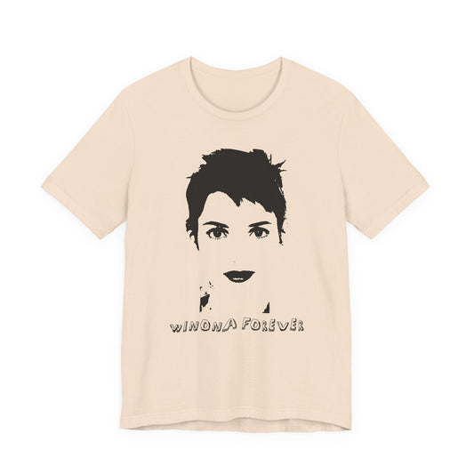Beige t-shirt with black graphic of a face and 'WINONA FOREVER' text on a white background