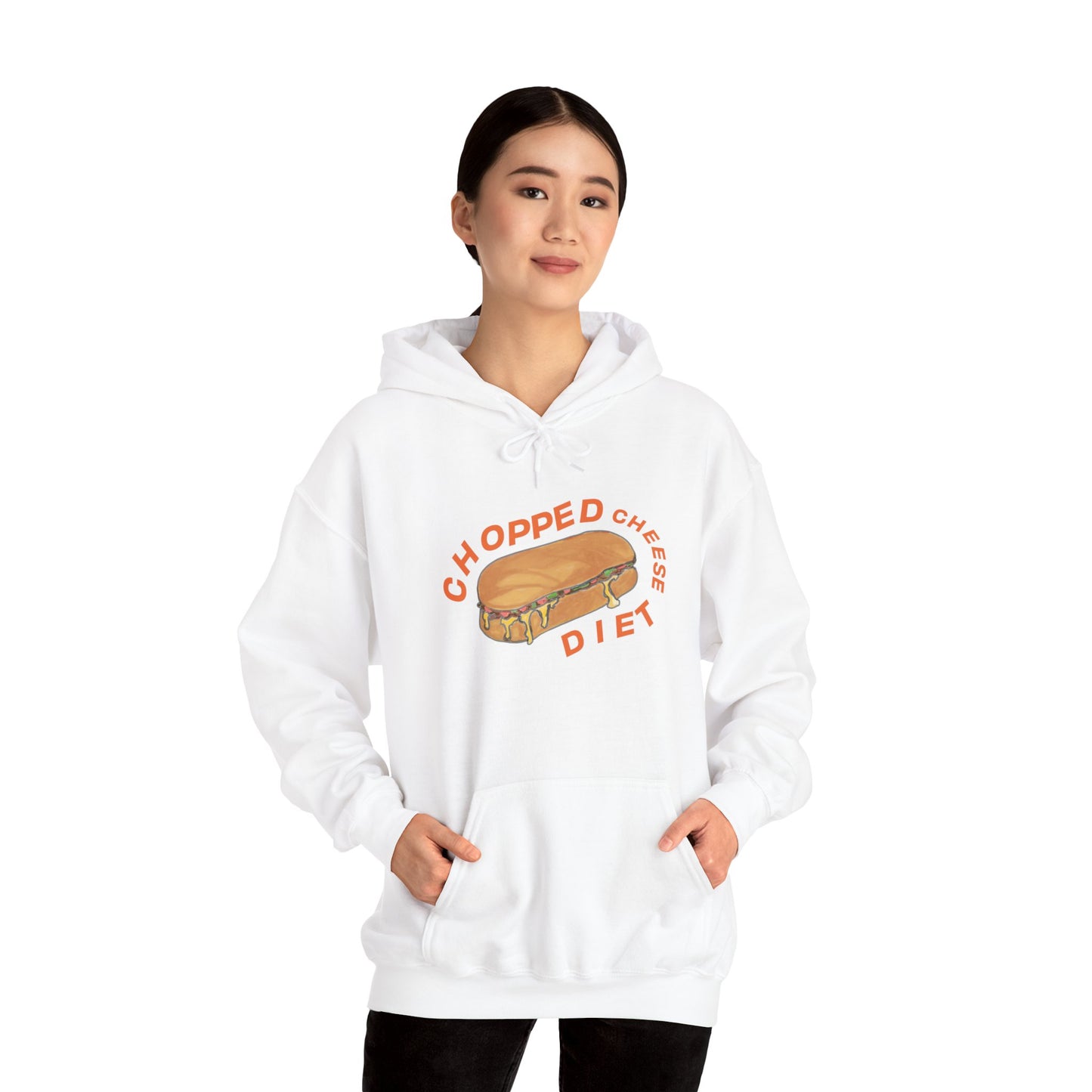 Person wearing white hoodie with “Chopped Cheese Diet” sandwich graphic, hands in front pocket.