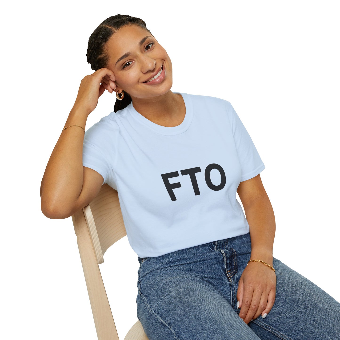 Person wearing a light blue t-shirt with 'FTO' text, sitting on a chair against a white background