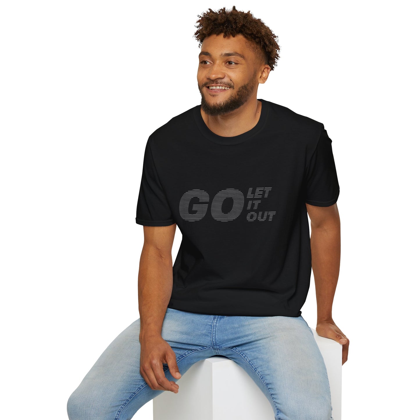 Man sitting wearing black Oasis Go Let It Out stencil t-shirt.