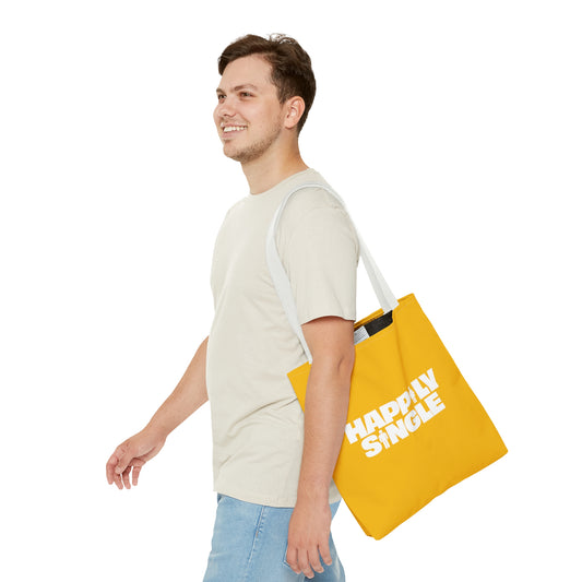 Yellow tote bag featuring the bold white text "Happily Single" with small male and female icons