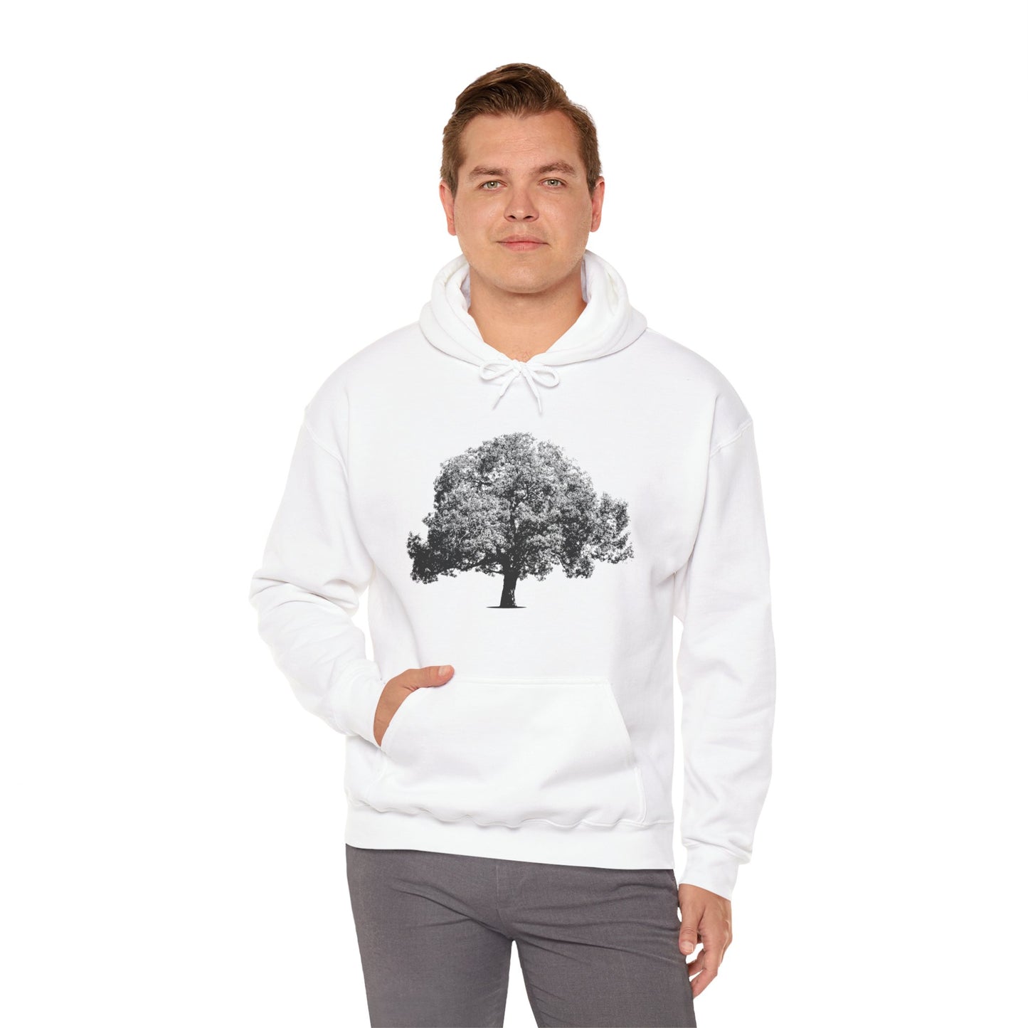 Man wearing white Tree Hoodie with black tree graphic