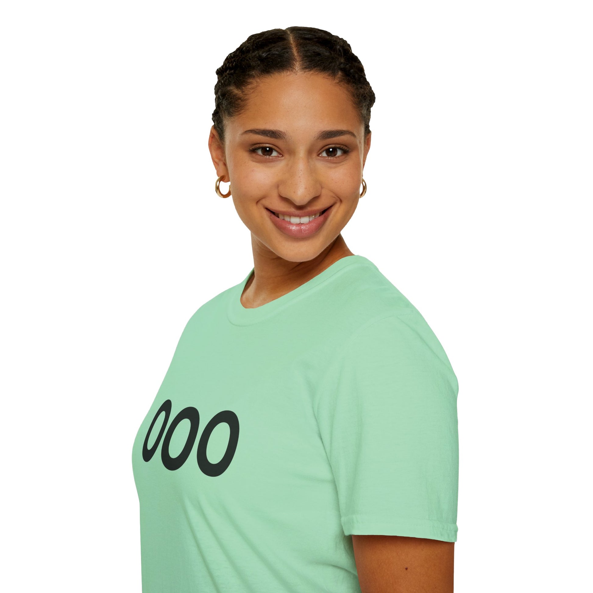 Woman smiling in light green OOO graphic T-shirt