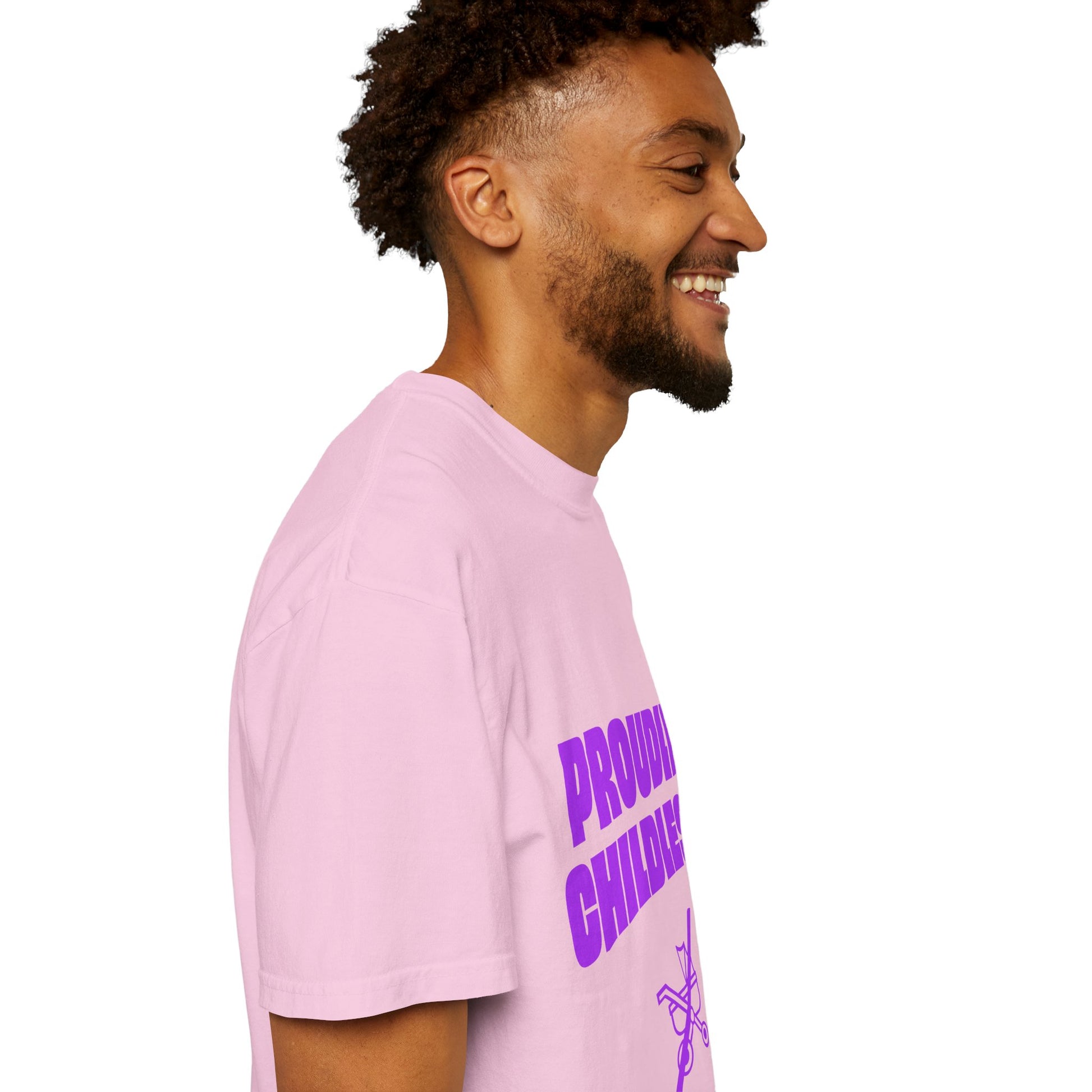 Man side view smiling in pink Proudly Childless T-Shirt with purple text