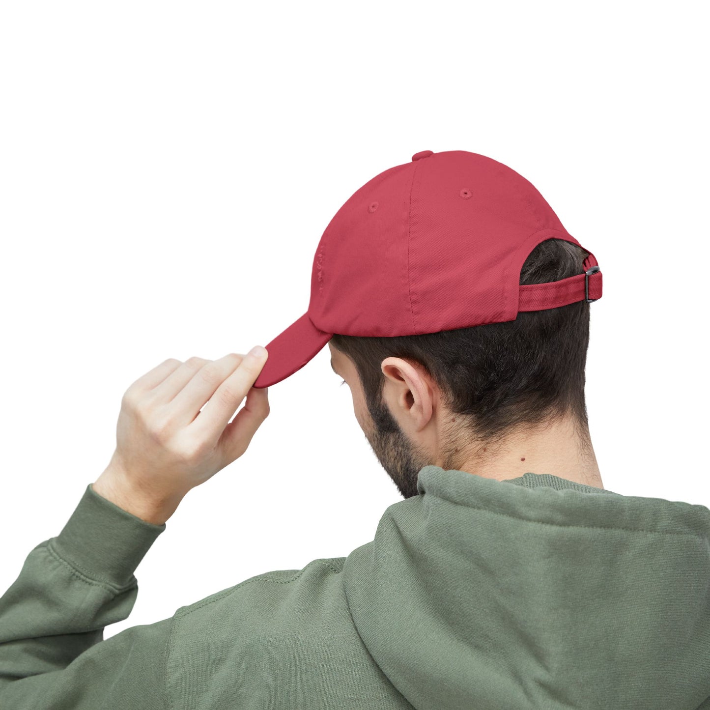 Person wearing a red cap and green jacket on a white background