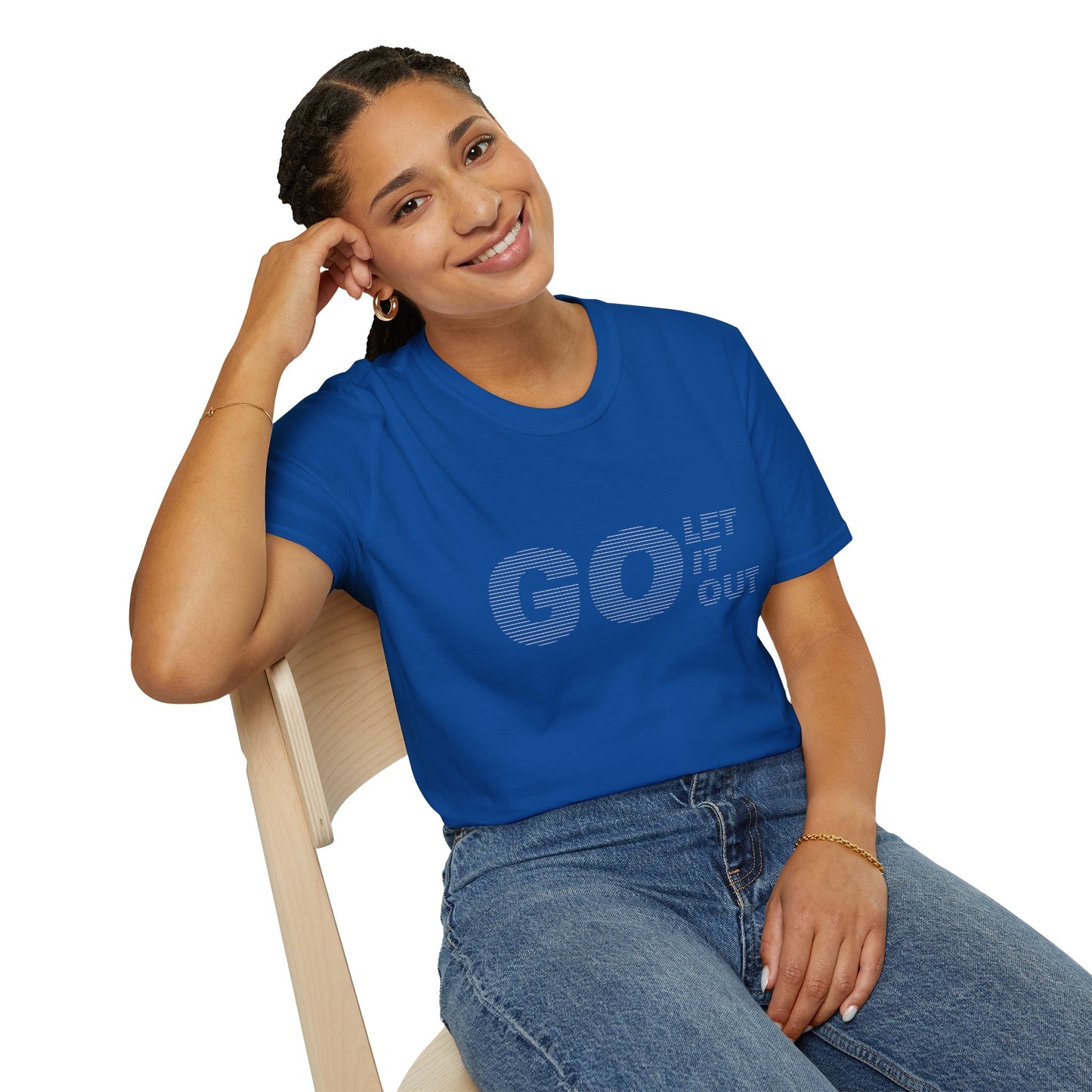 Woman sitting and smiling in blue Oasis Go Let It Out stencil t-shirt.
