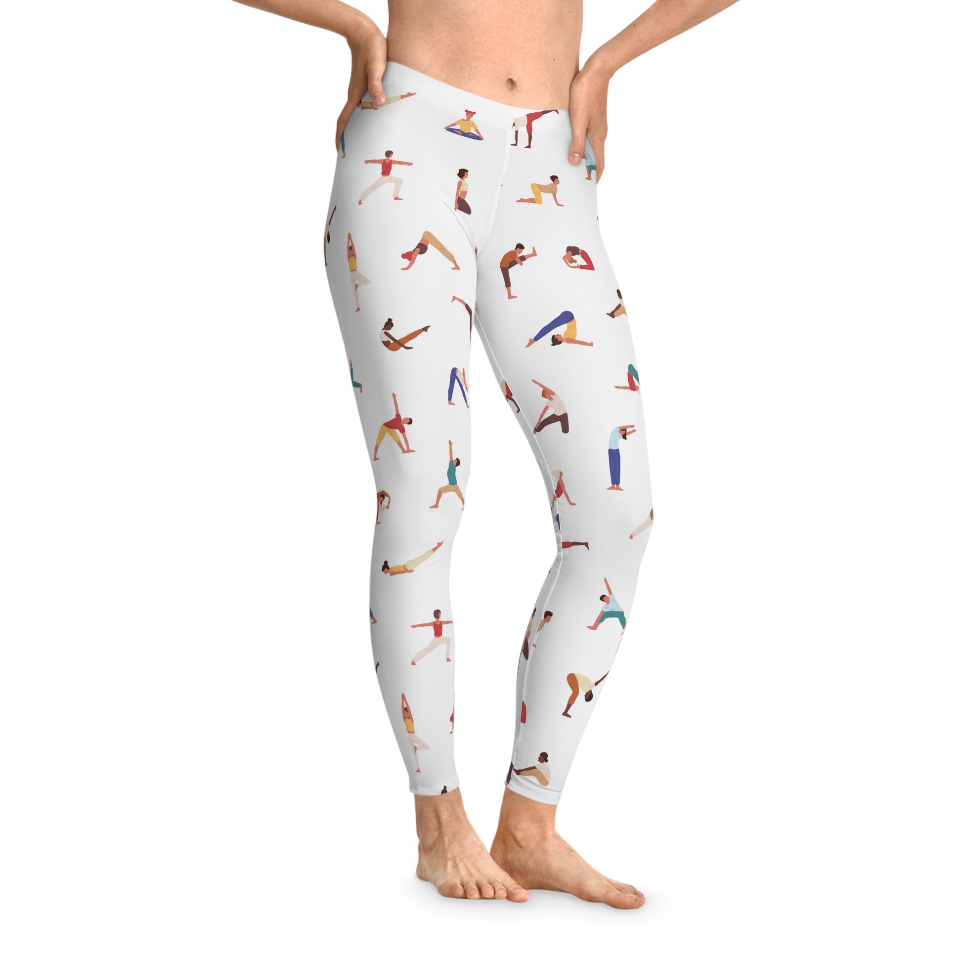 Model wearing Yogini Leggings in white with colorful yogini pose illustrations, front view.