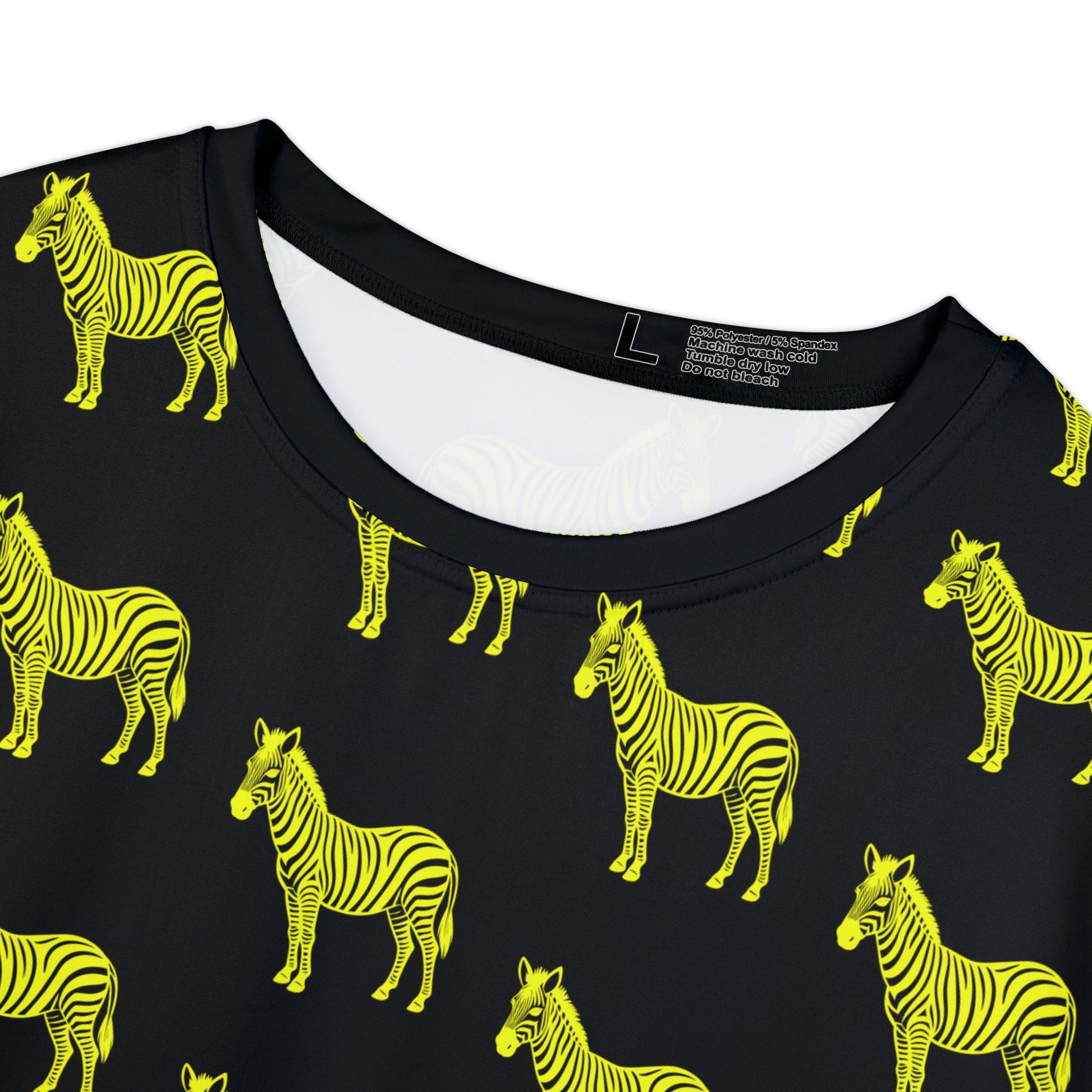 Close-up of Yellow Zebra Women's T-Shirt collar and neckline with neon zebra print on black fabric.