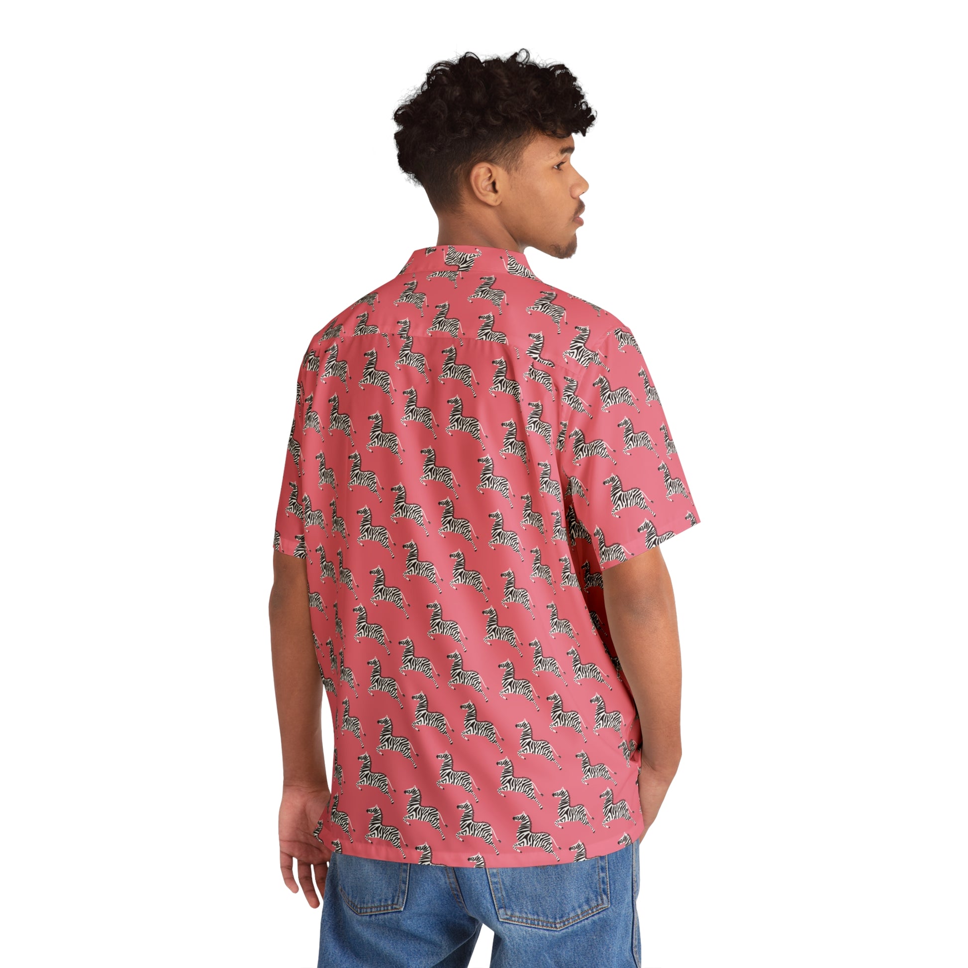 Back view of pink short-sleeve shirt laid flat, showing full zebra pixel art pattern.