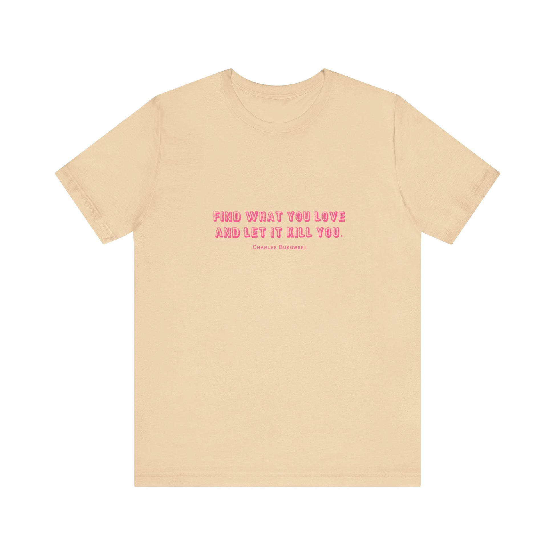 A cream colored Bukowski quote T-shirt lay flat on a white background