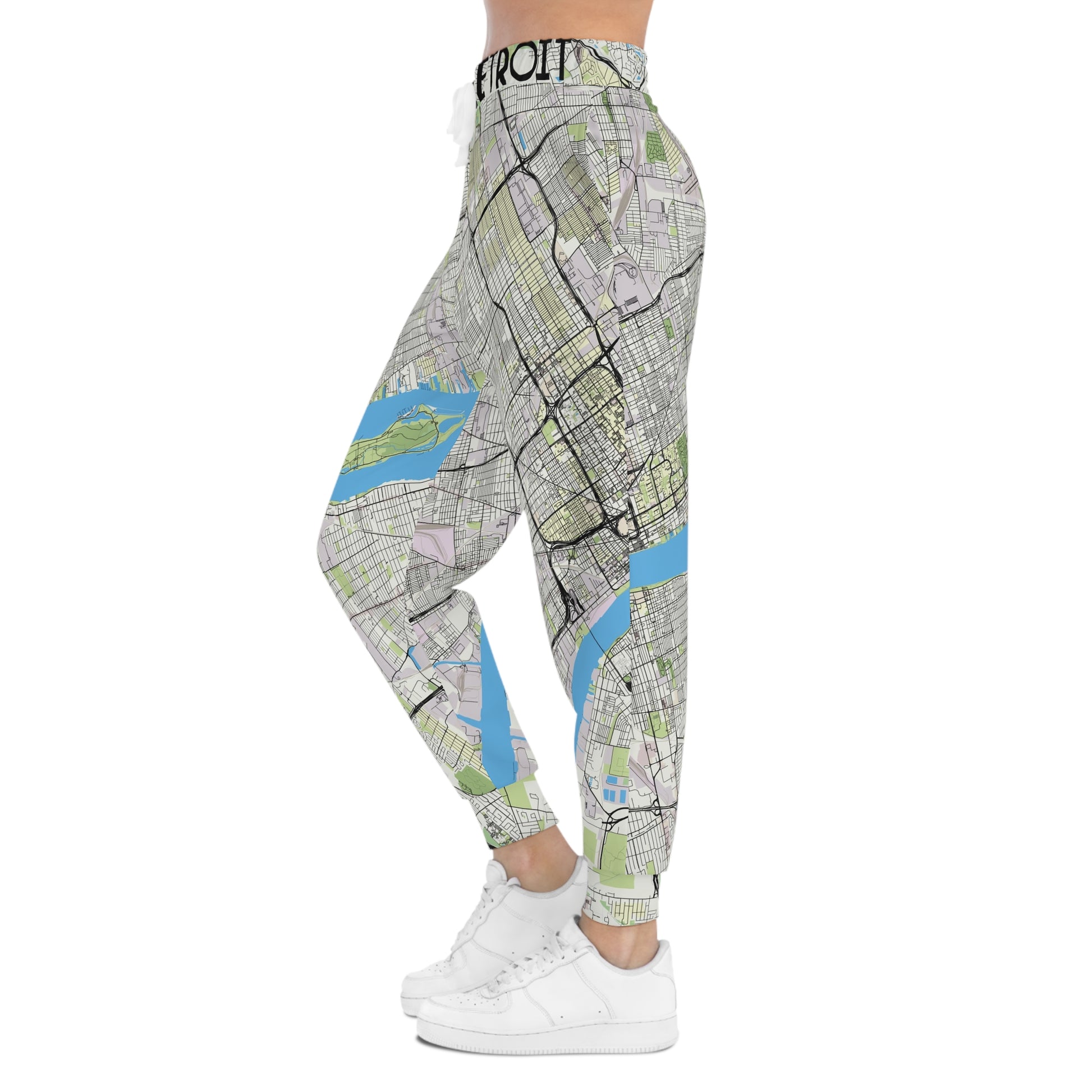Side angle of Detroit Joggers on female model showing tapered fit and map design