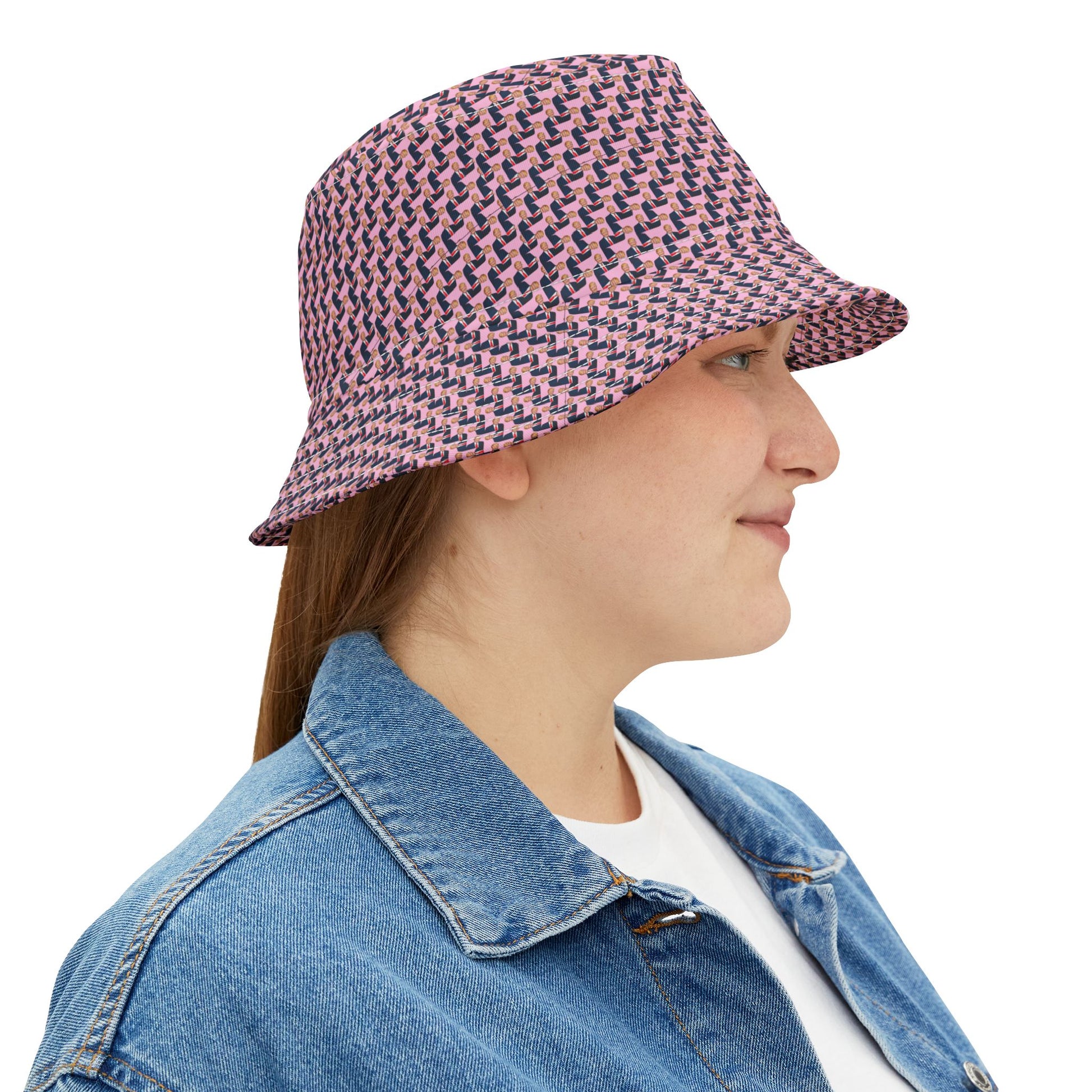 Woman in side profile wearing Donald Trump Bucket Hat with patterned red and blue print.