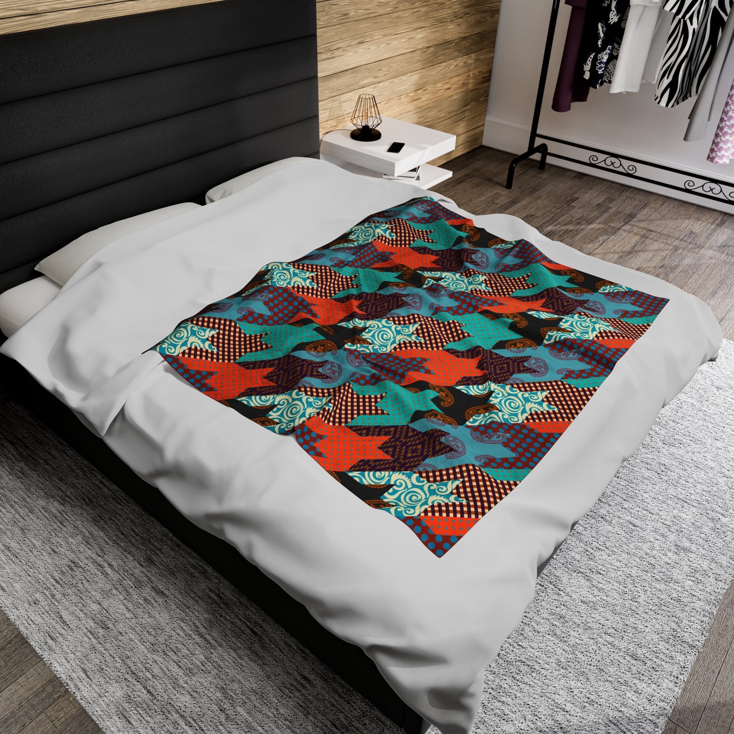 Modern Quilt Plush Blanket folded on bed from top view