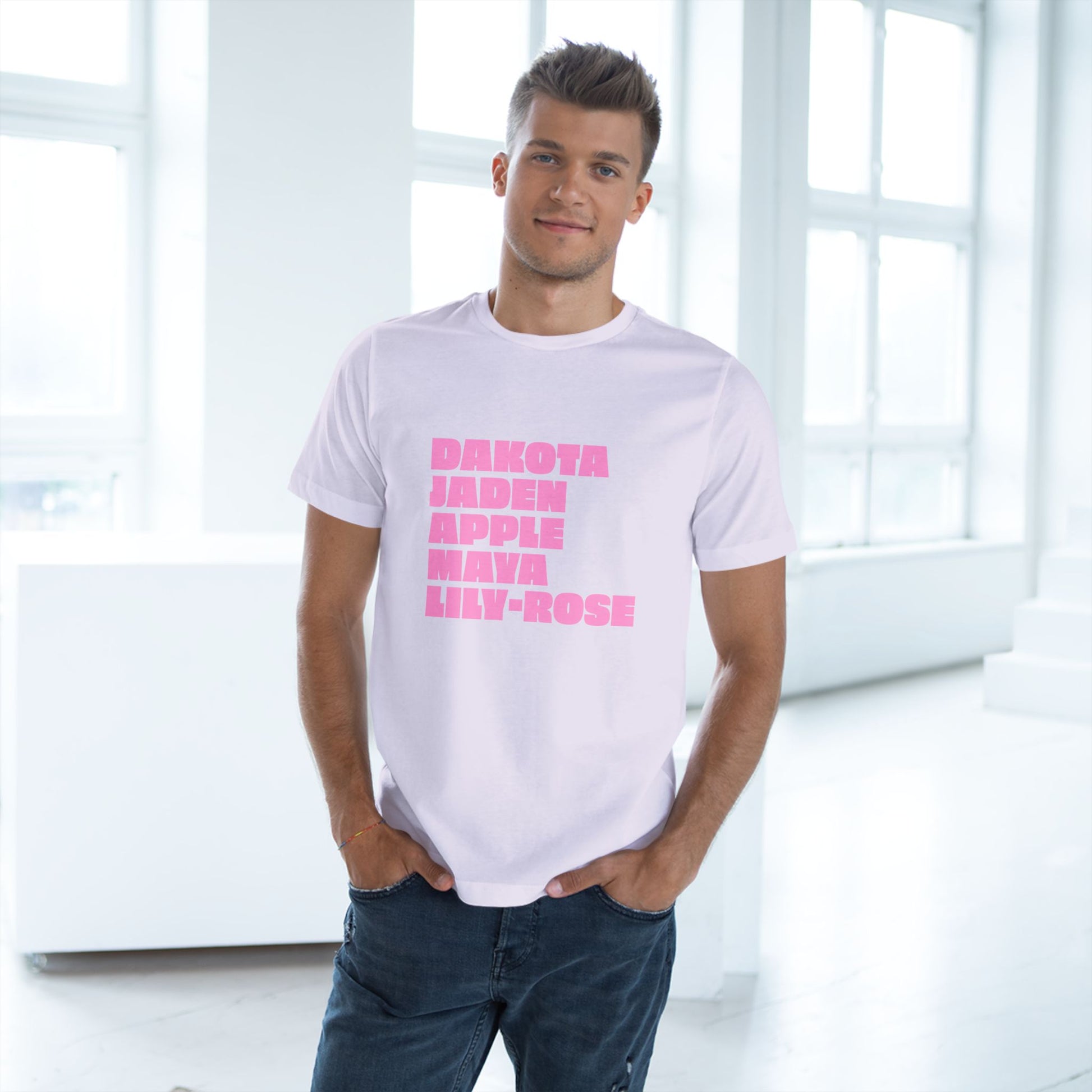 White Nepo Babies List T-Shirt with pink lettering worn by male model