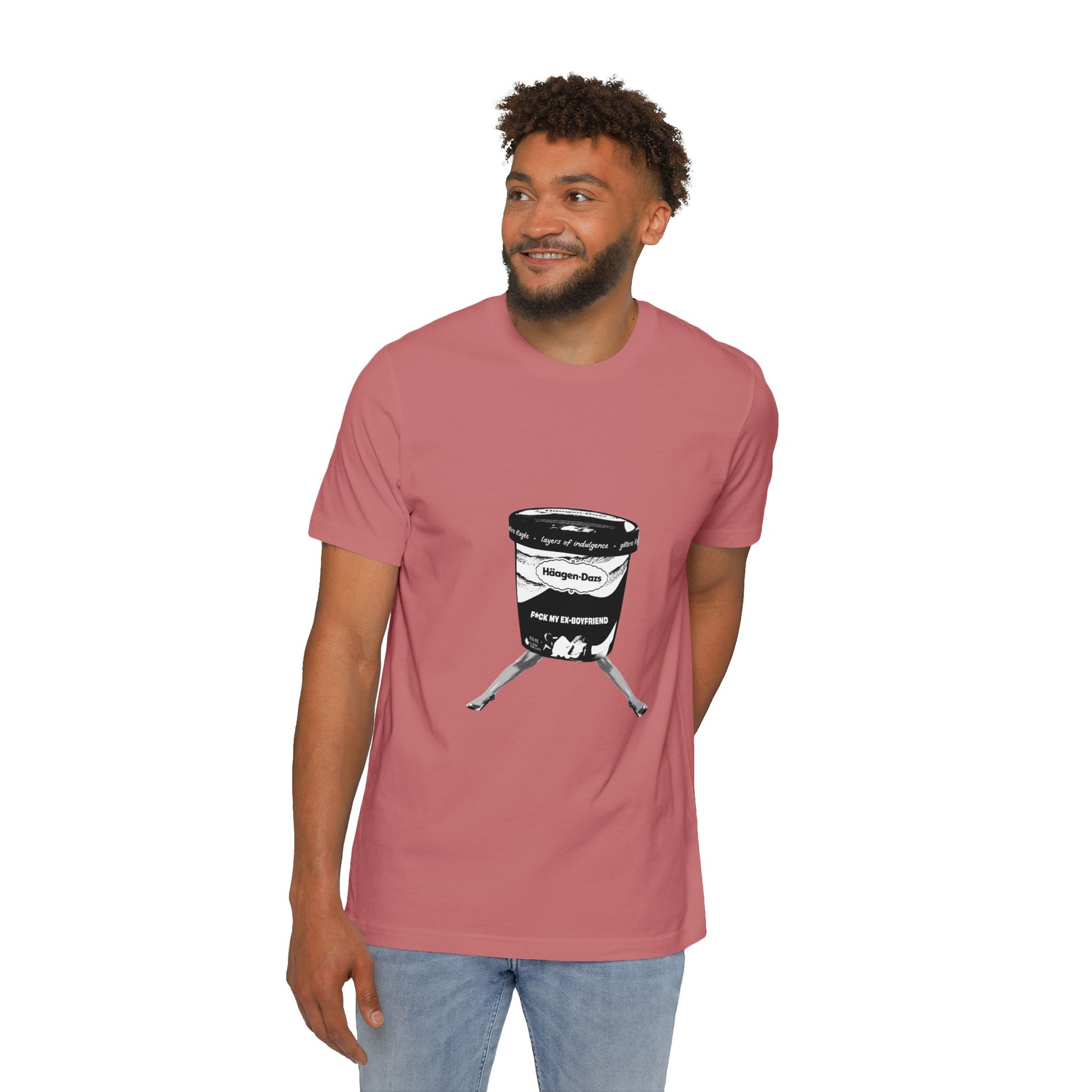 Man standing in rose-pink t-shirt featuring breakup message and illustrated graphic