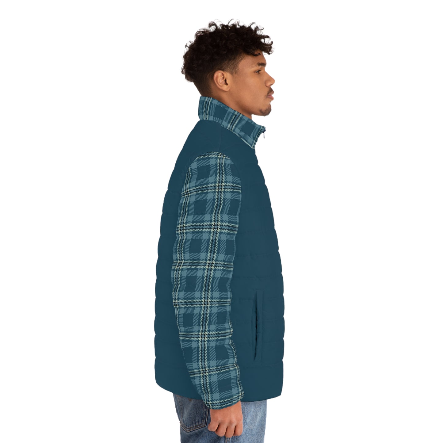 Man wearing a teal quilted jacket with plaid pattern on a white background