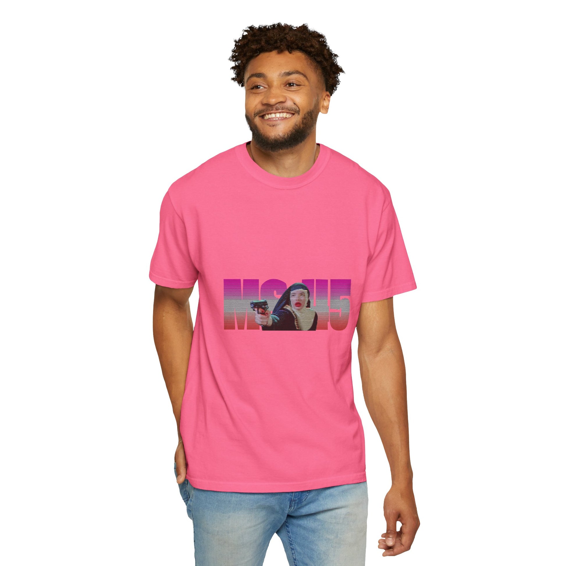 Man wearing pink Ms.45 T-Shirt standing and smiling