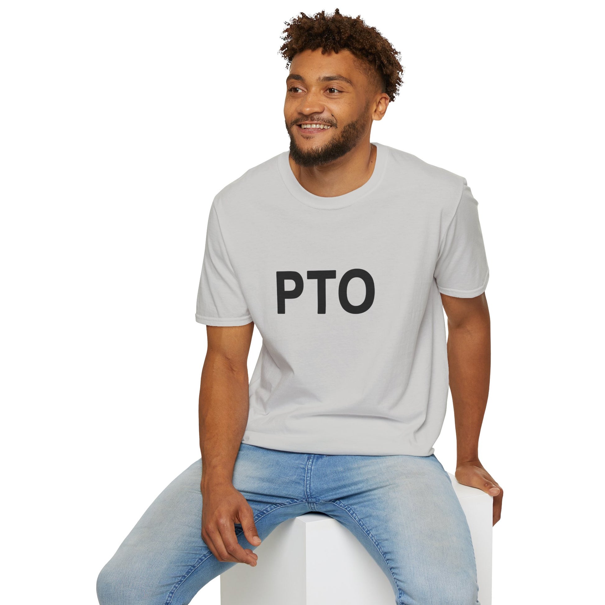 Man wearing a gray t-shirt with 'PTO' text, sitting on a white stool against a white background