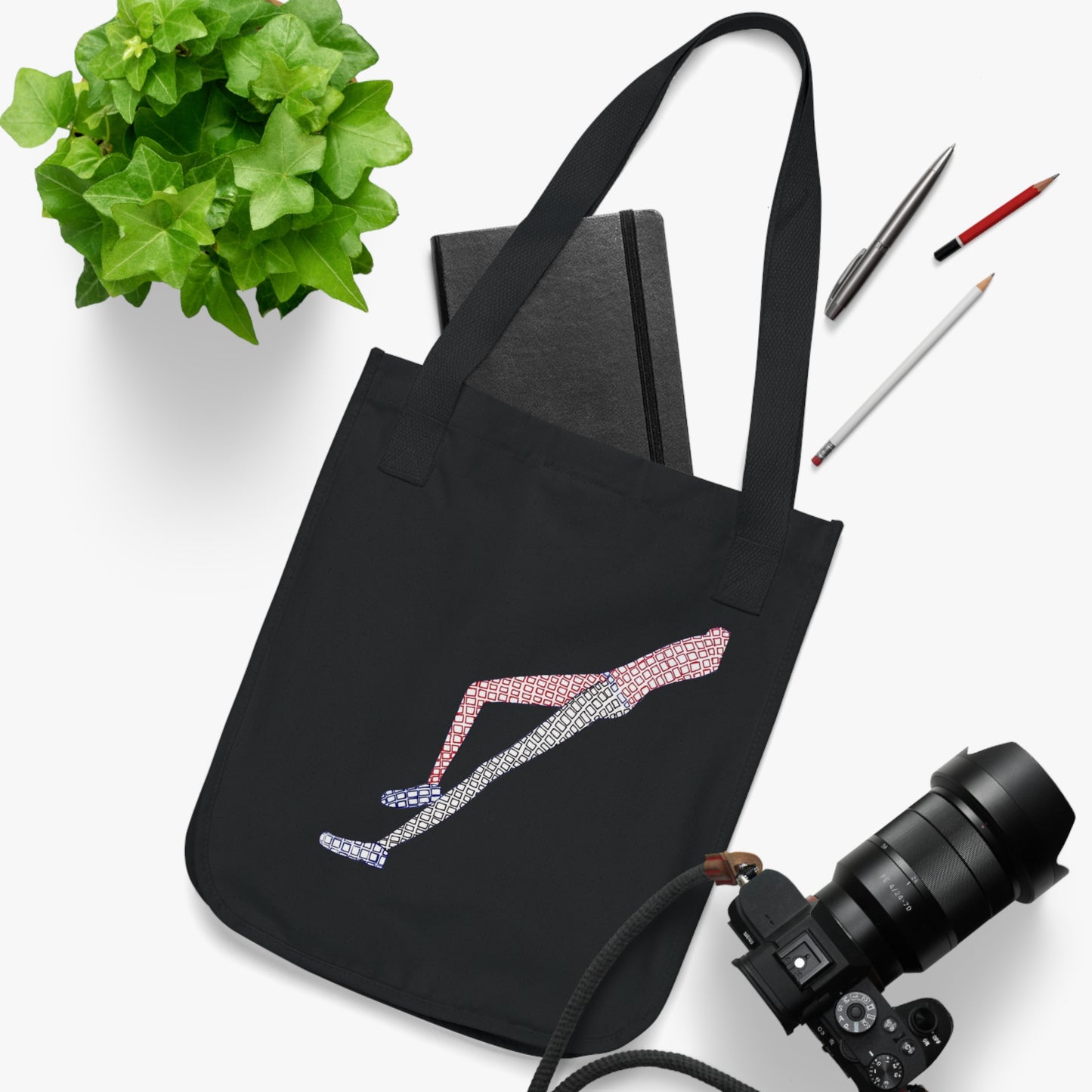 Black Shapes in Shapes Organic Tote Bag styled with items inside