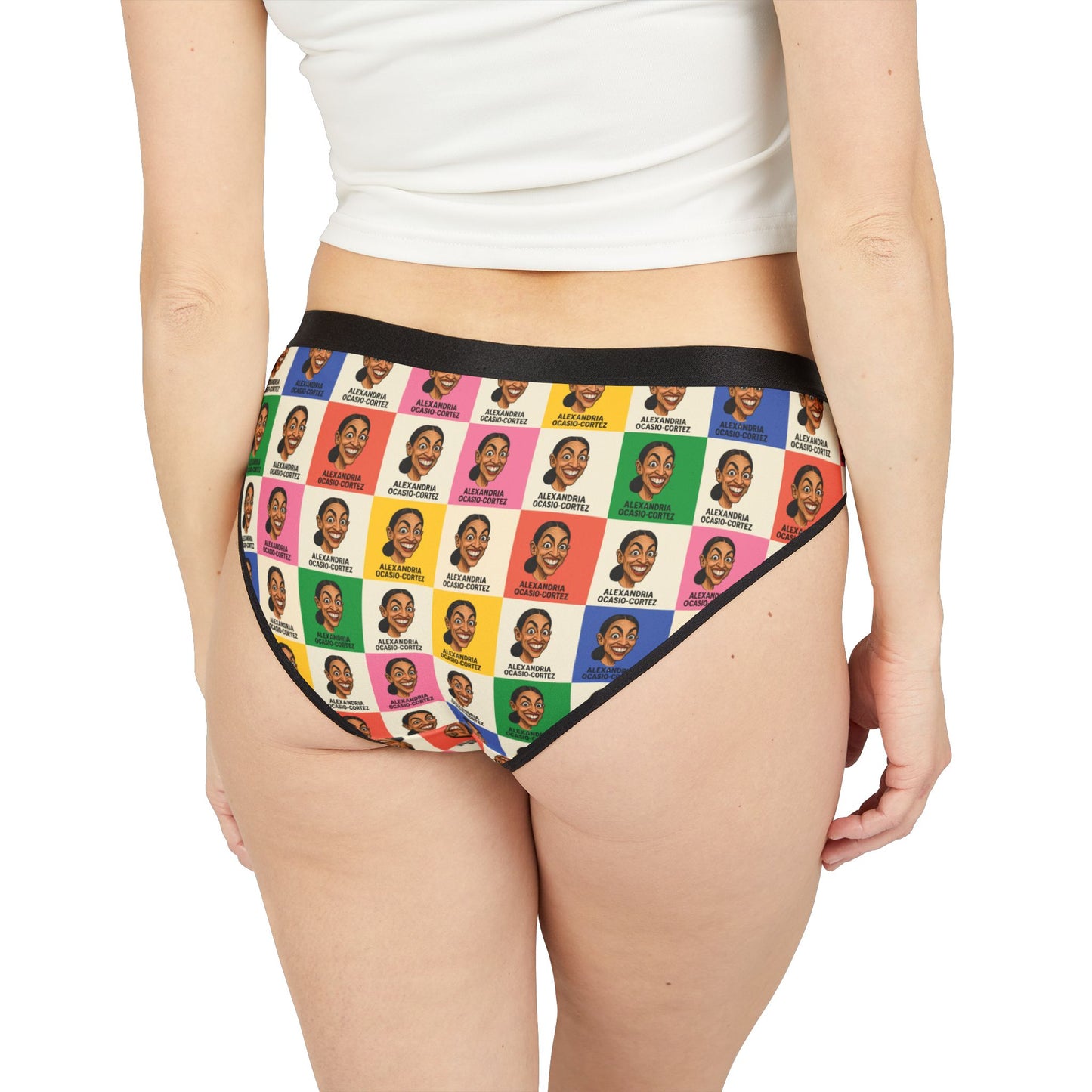 Back view of model wearing AOC panties featuring Alexandria Ocasio-Cortez face print in colorful pop art grid with black waistband