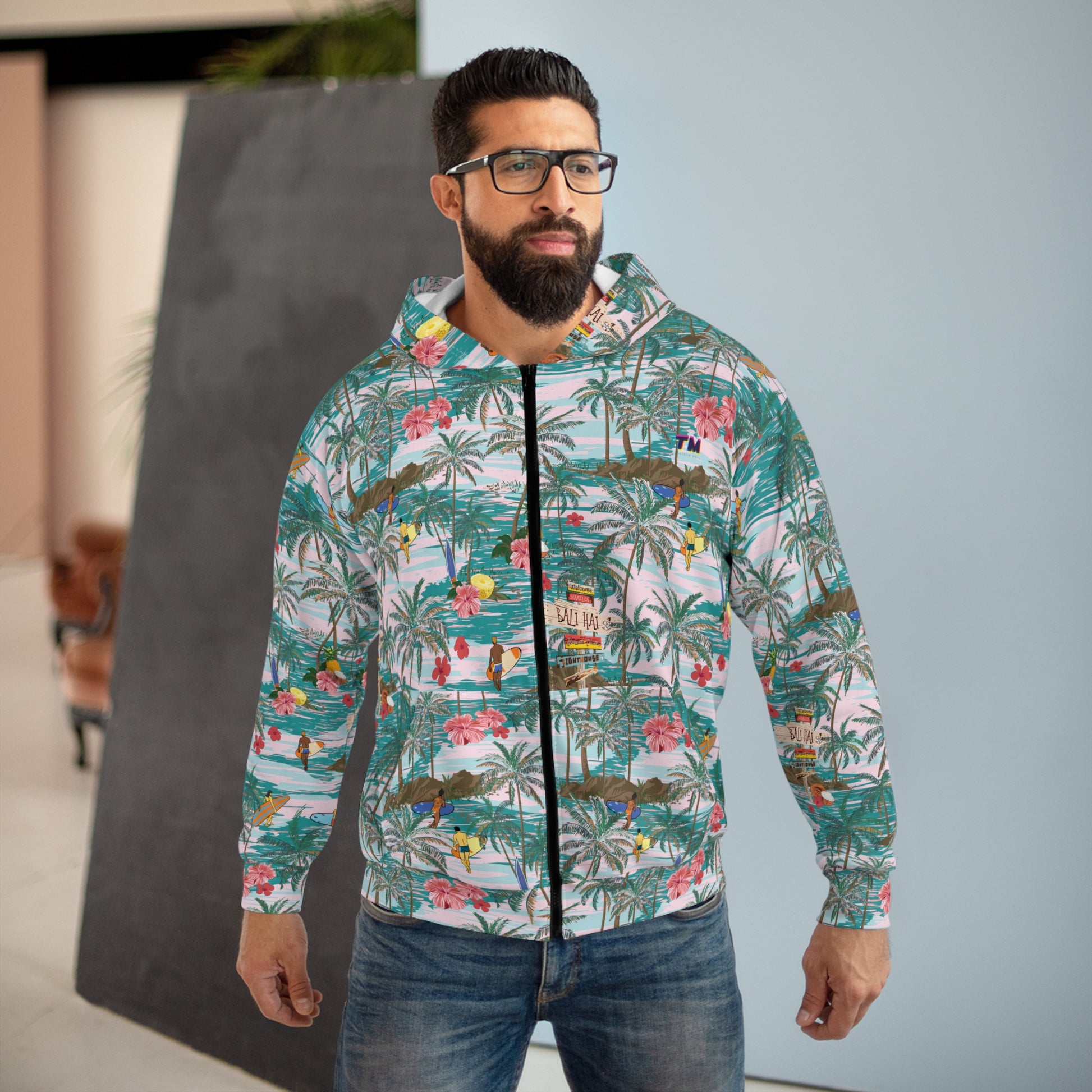 Male model wearing Hawaiian Zip Hoodie outdoors styled with jeans.