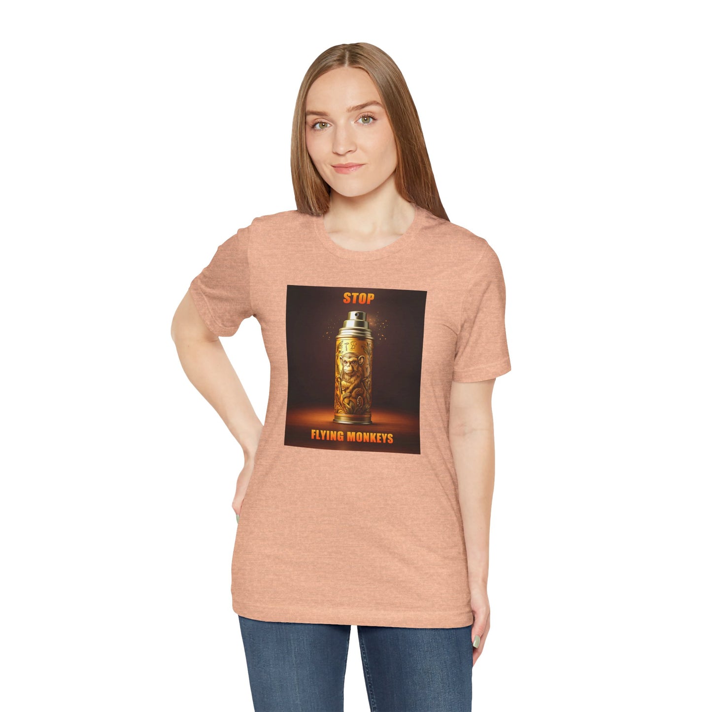 Woman wearing peach Stop Flying Monkeys T-Shirt standing confidently