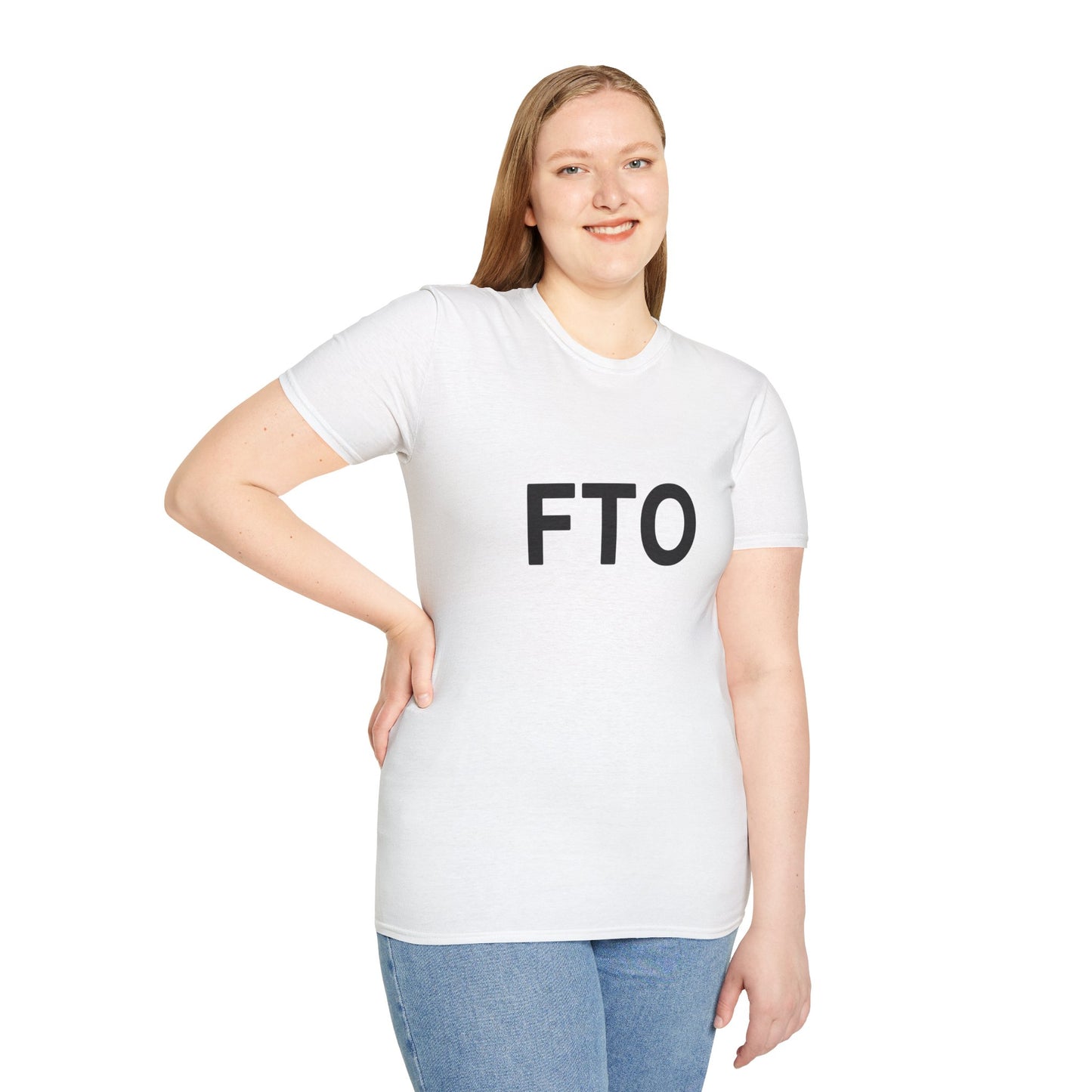 Woman standing wearing white FTO T-shirt with jeans