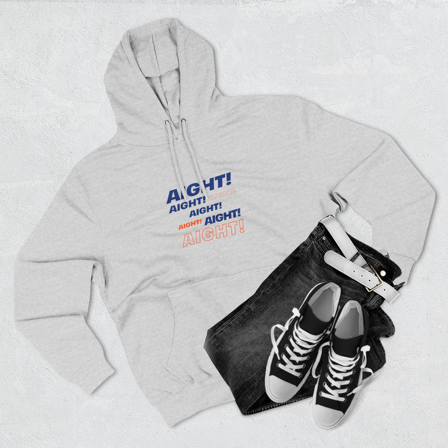 Flat lay of grey AIGHT hoodie with sneakers and jeans