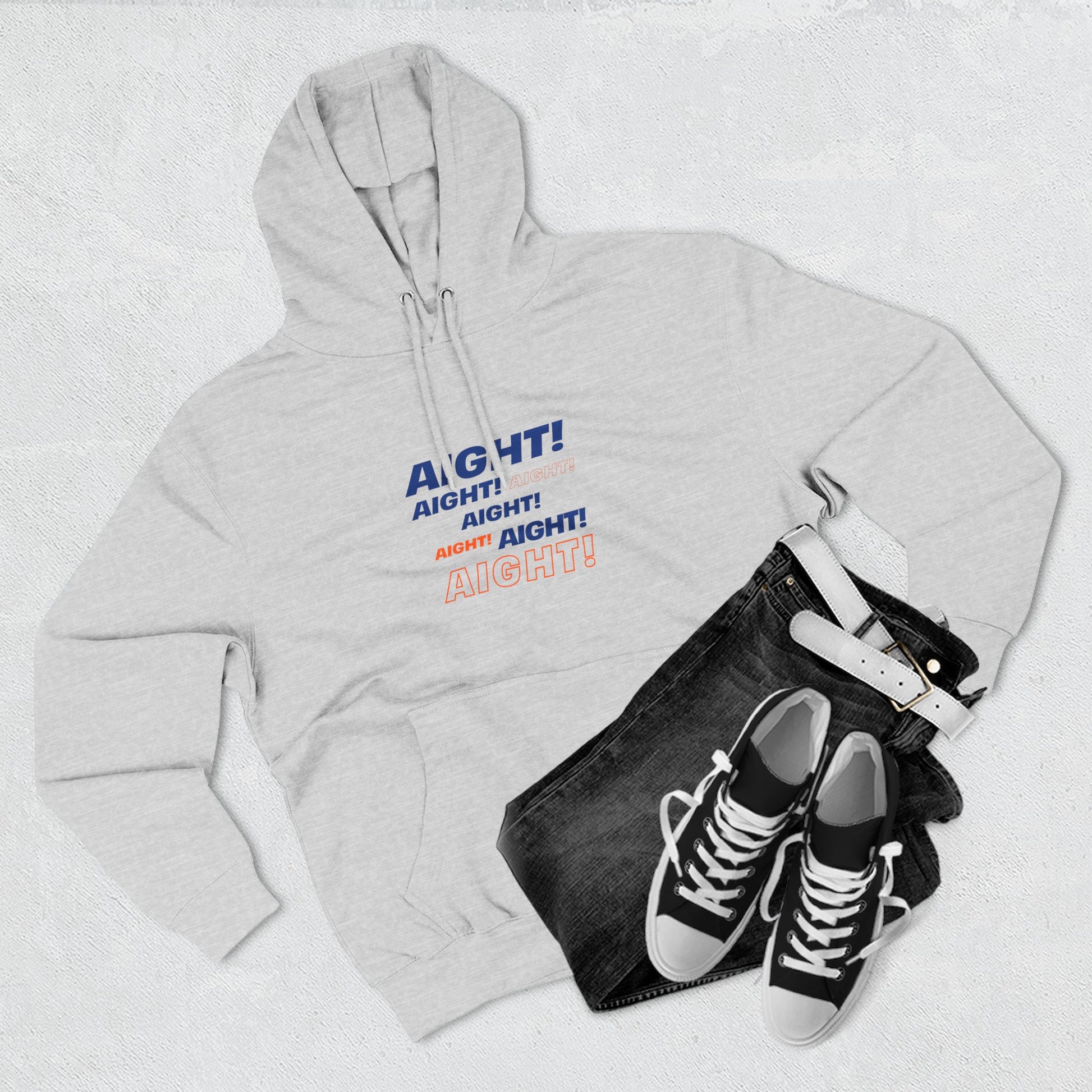 Flat lay of grey AIGHT hoodie with sneakers and jeans