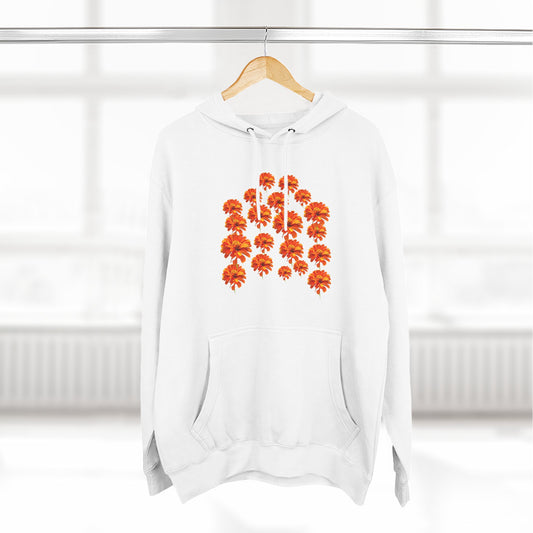 White Zinnia Hoodie on a hanger with orange flower design